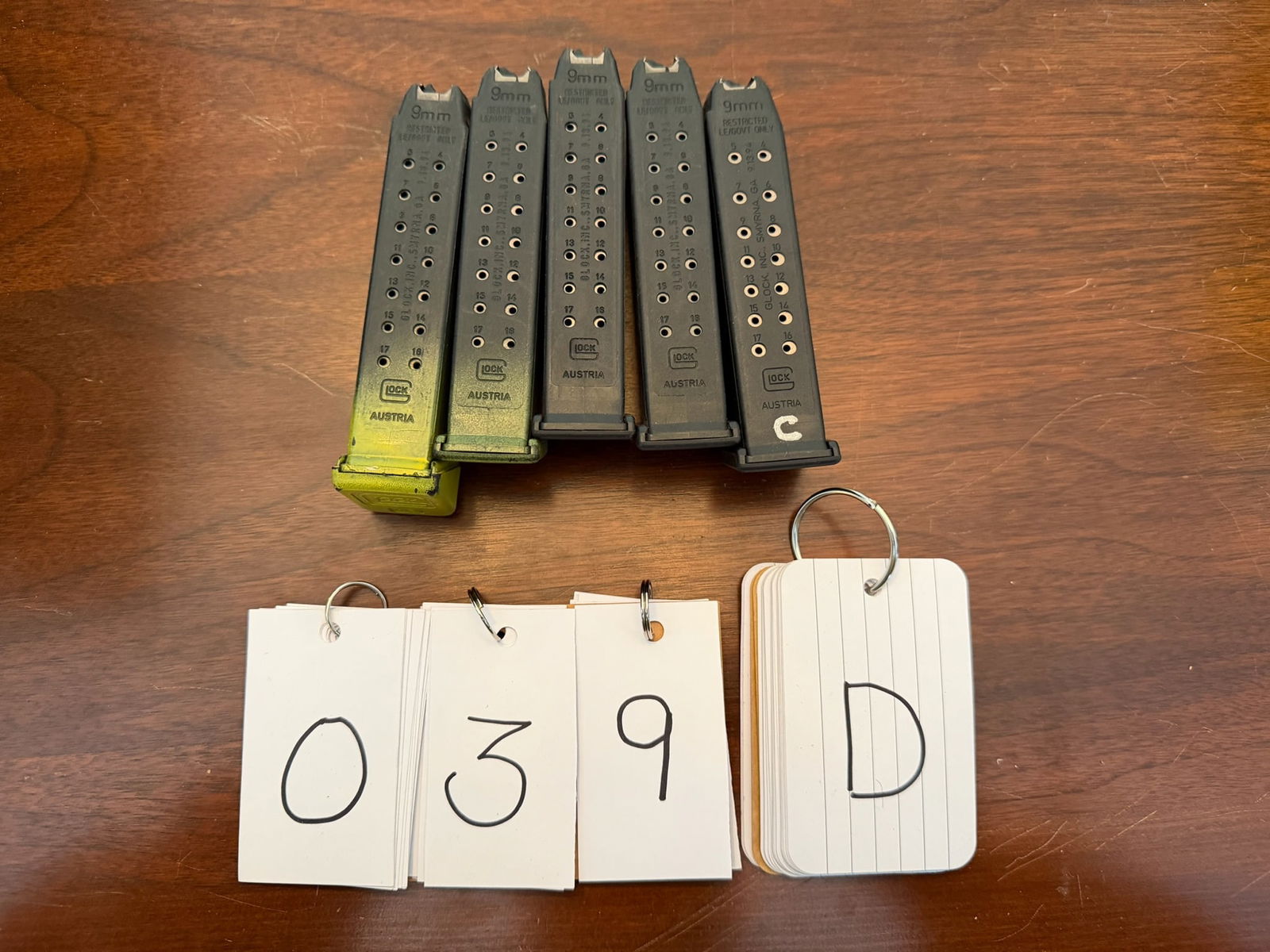 Five Glock 9mm High Capacity Magazines: Five Glock 9mm high capacity magazines. All marked 17 rounds. One marked on the bottom "+2". Two have yellow paint on them. See photos. LEO, FFL OR OUT OF STATE SALES ONLY. MAGAZINES ARE NOT NYS