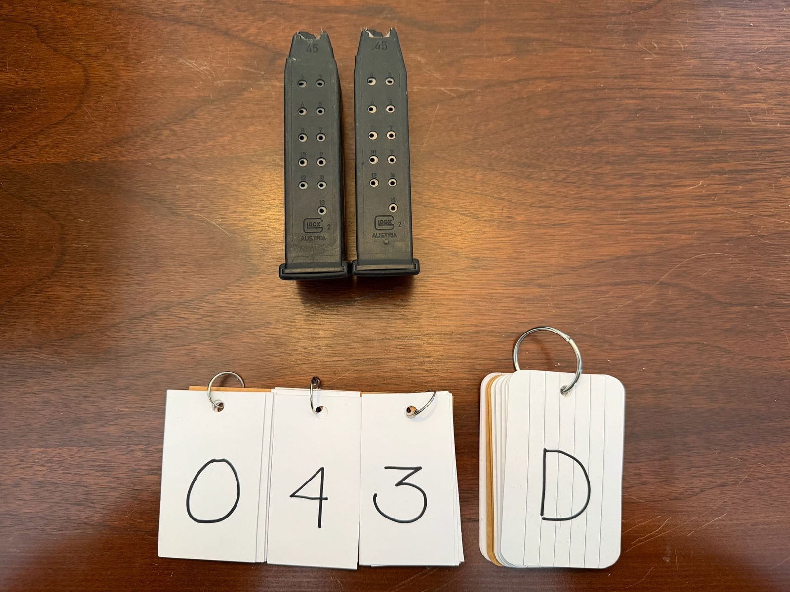 Two Glock 45 Caliber Magazines: Two Glock 45 caliber magazines. 13 rounds each. See photos. LEO, FFL OR OUT OF STATE SALES ONLY. LARGER MAGAZINES ARE NOT NYS COMPLIANT.