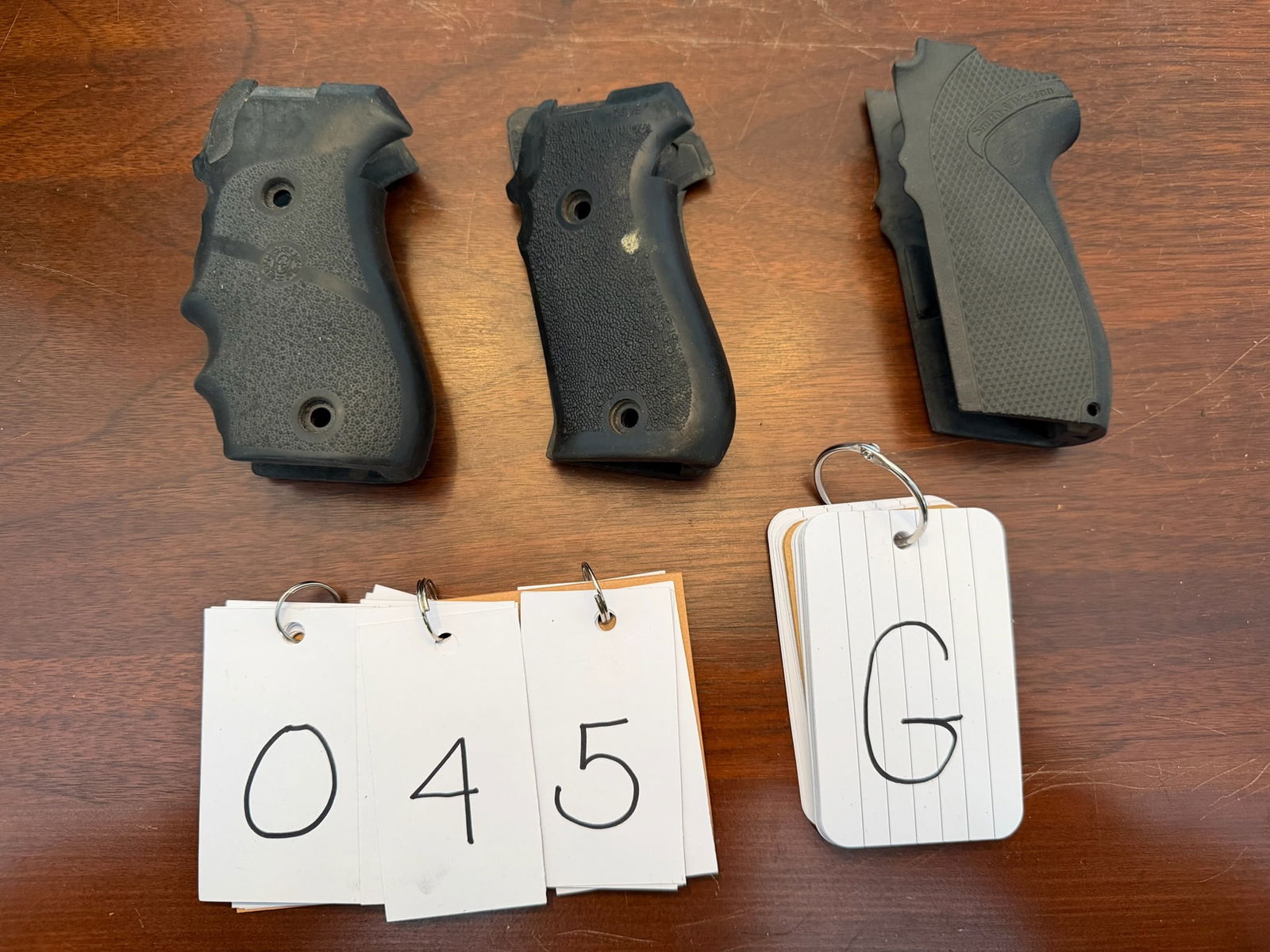 Assorted Lot of Semi-Automatic Handgun Grip (1 of 1)