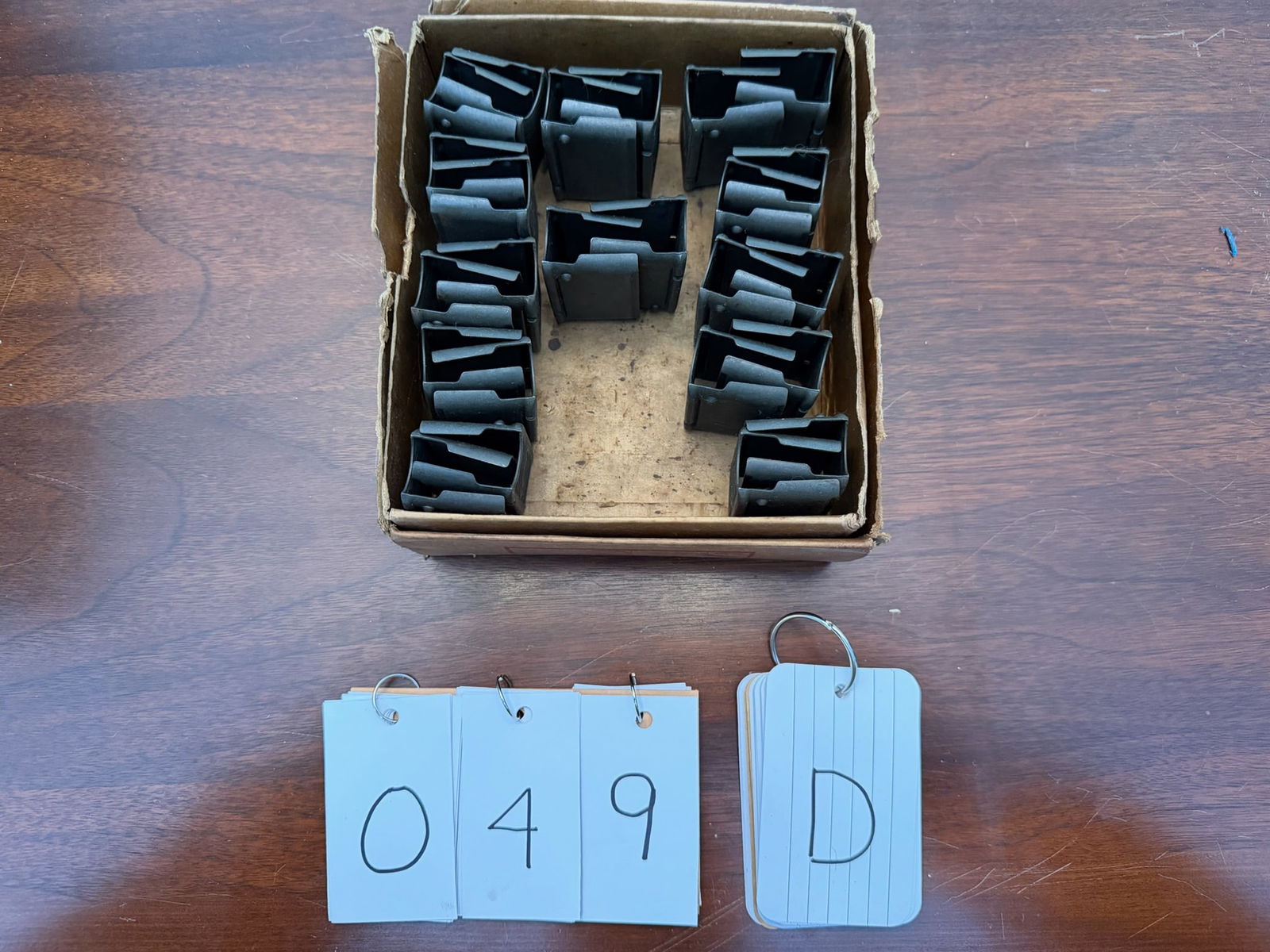 24 Springfield Armory M1 Garand Clips: 24 Springfield Armory M1 Garand clips in the original factory box. See photos.