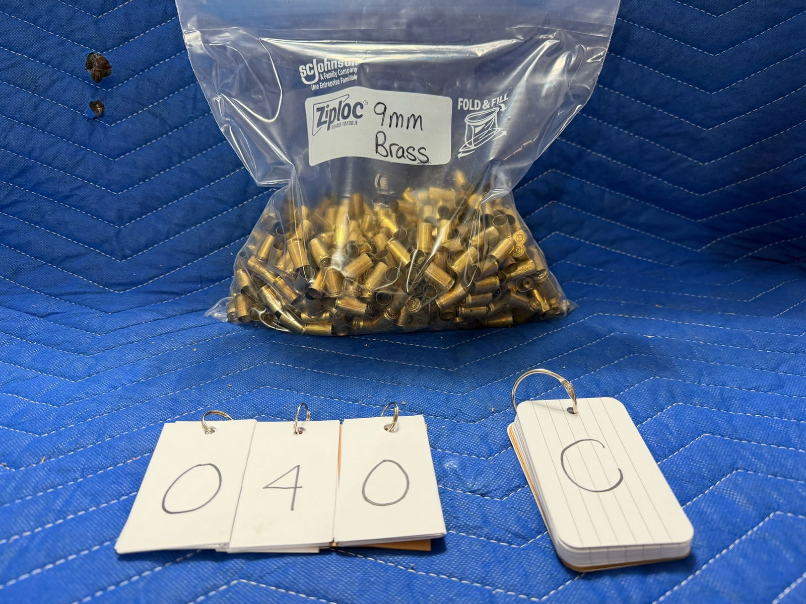 9mm Brass: 9mm brass casings. 5.0 pounds total. Approximately 115 casings per pound. See photos.