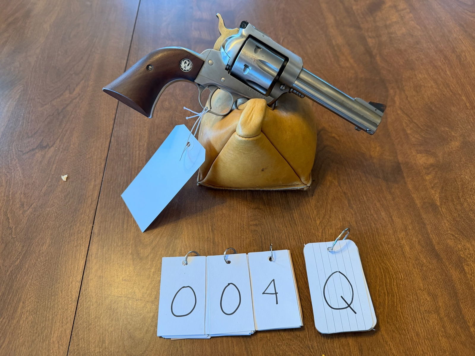 Ruger New Model Blackhawk: Ruger New Model Blackhawk. 357 Magnum. 4.625" barrel. Stainless single action six-shot revolver. Minor surface rust on the front sight. New old stock with the original box. Serial No. 32-58711. See ph