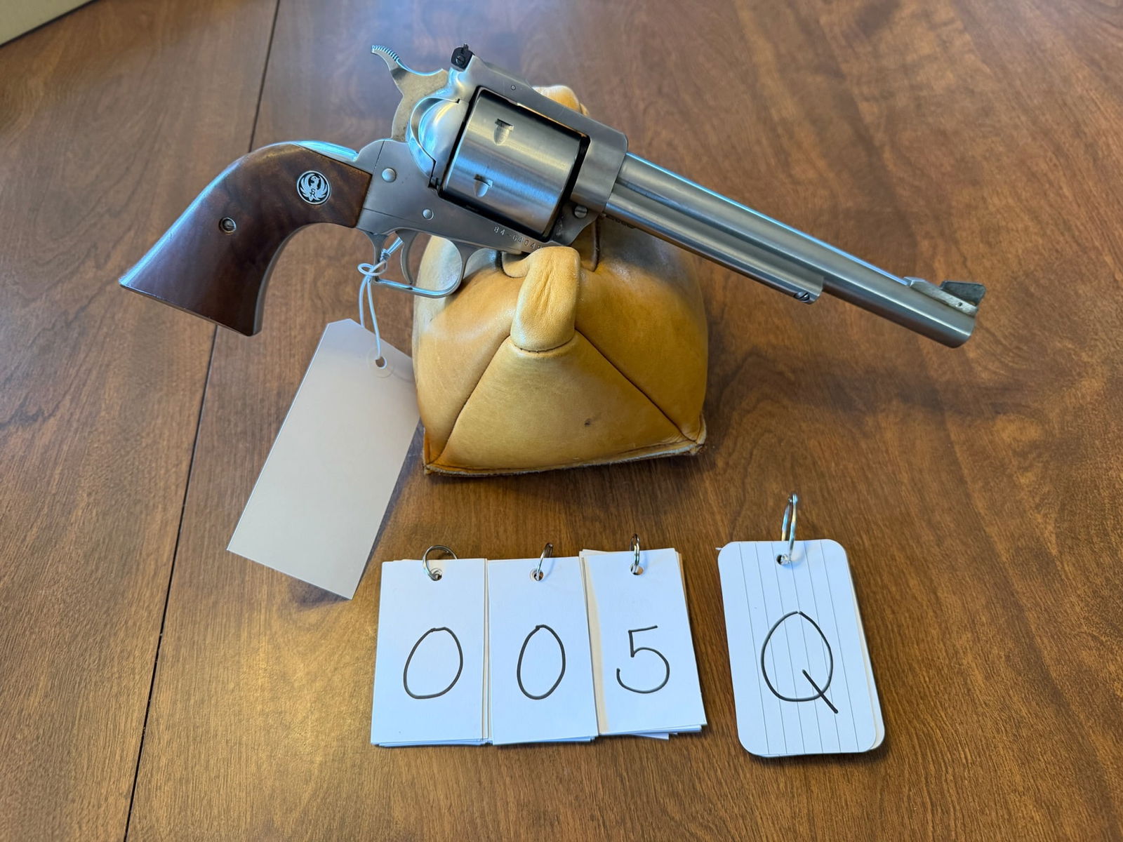 Ruger New Model Super Blackhawk: Ruger New Model Super Blackhawk. 44 Magnum. 7.5" barrel. Stainless single action six-shot revolver. Adjustable sights. New old stock with the original box and paperwork. Serial No. 84-64048. See photo