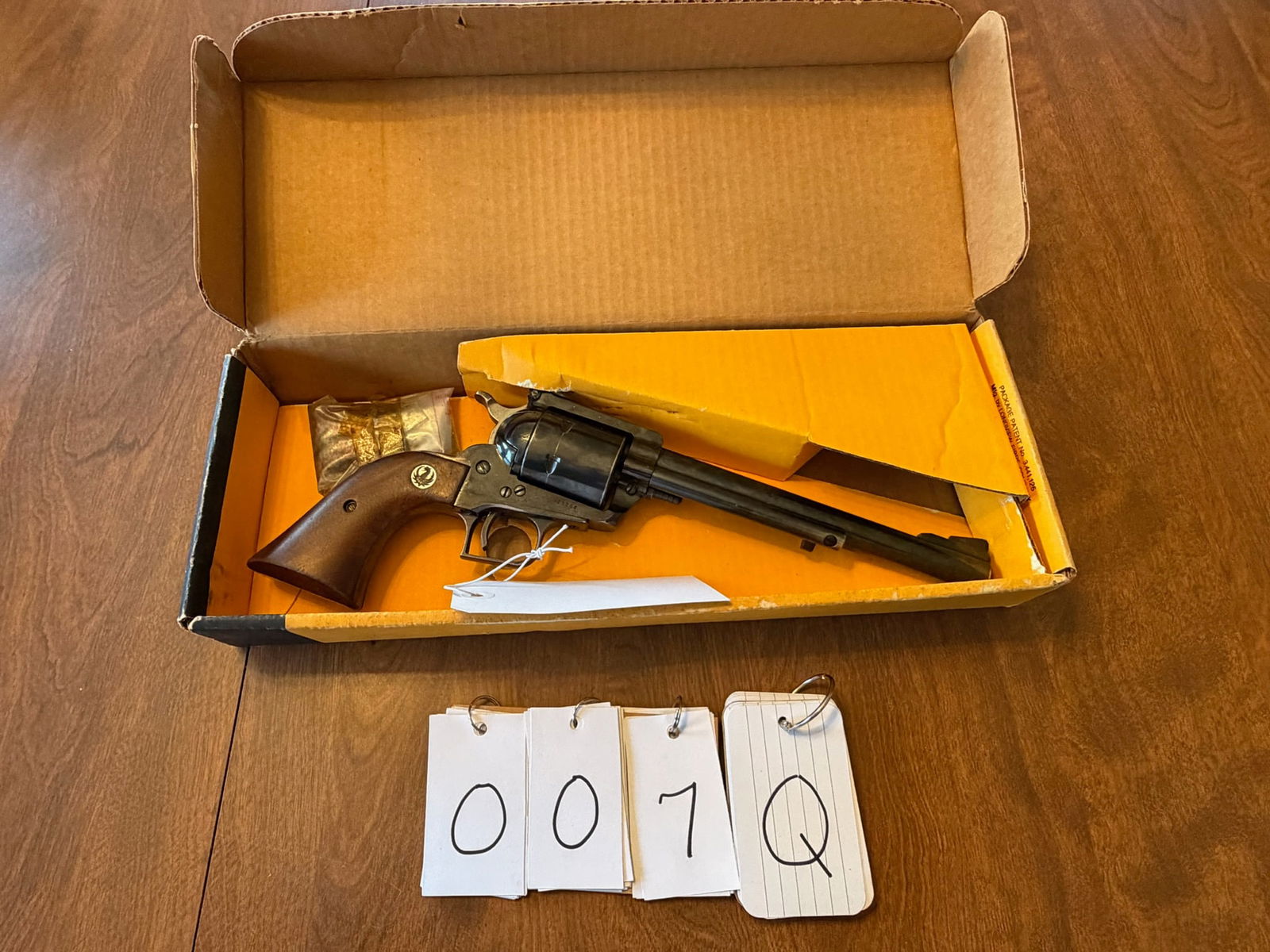 Ruger Super Blackhawk: Ruger Super Blackhawk. 44 Magnum. 7.5" barrel. Blued single action six-shot revolver. Some bluing missing at end of barrel. New old stock with the original box. Serial No. 13754. See photos.