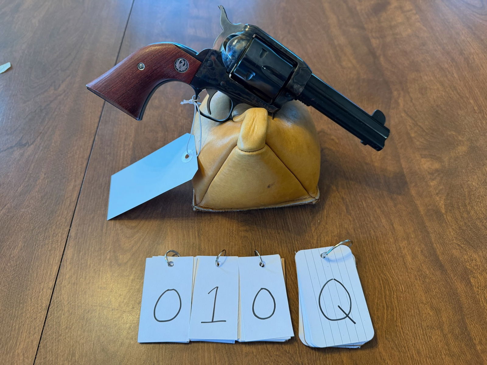 Ruger Vaquero: Ruger Vaquero. 45 Colt. 4.625" barrel. Blued single action six-shot revolver. Case hardened coloring. Fixed sights. New old stock with the original box. Serial No. 55-26395. See photos.