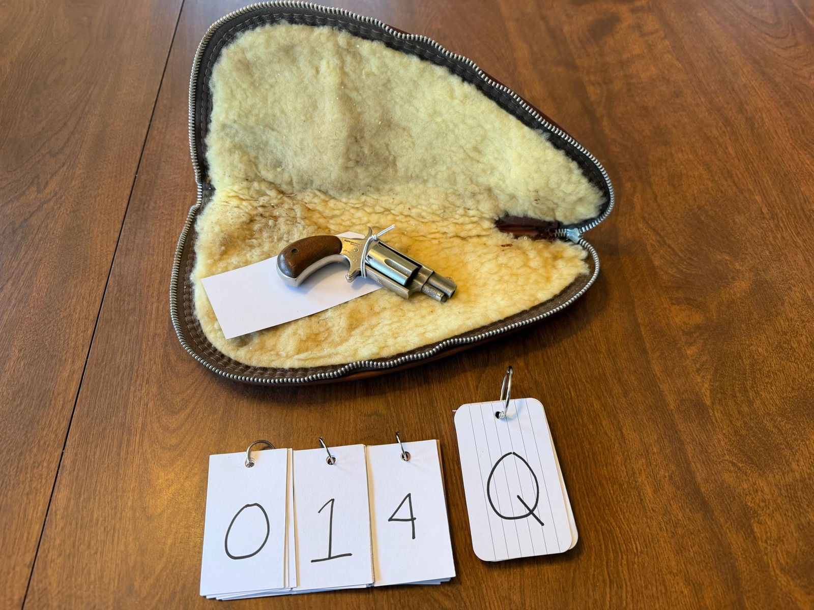 North American Arms Mini 22 Magnum: North American Arms Mini 22 Magnum. 22 Magnum. 1.25" barrel. Stainless single action five-shot revolver. Comes with soft pouch case. Serial No. D22501. See photos.