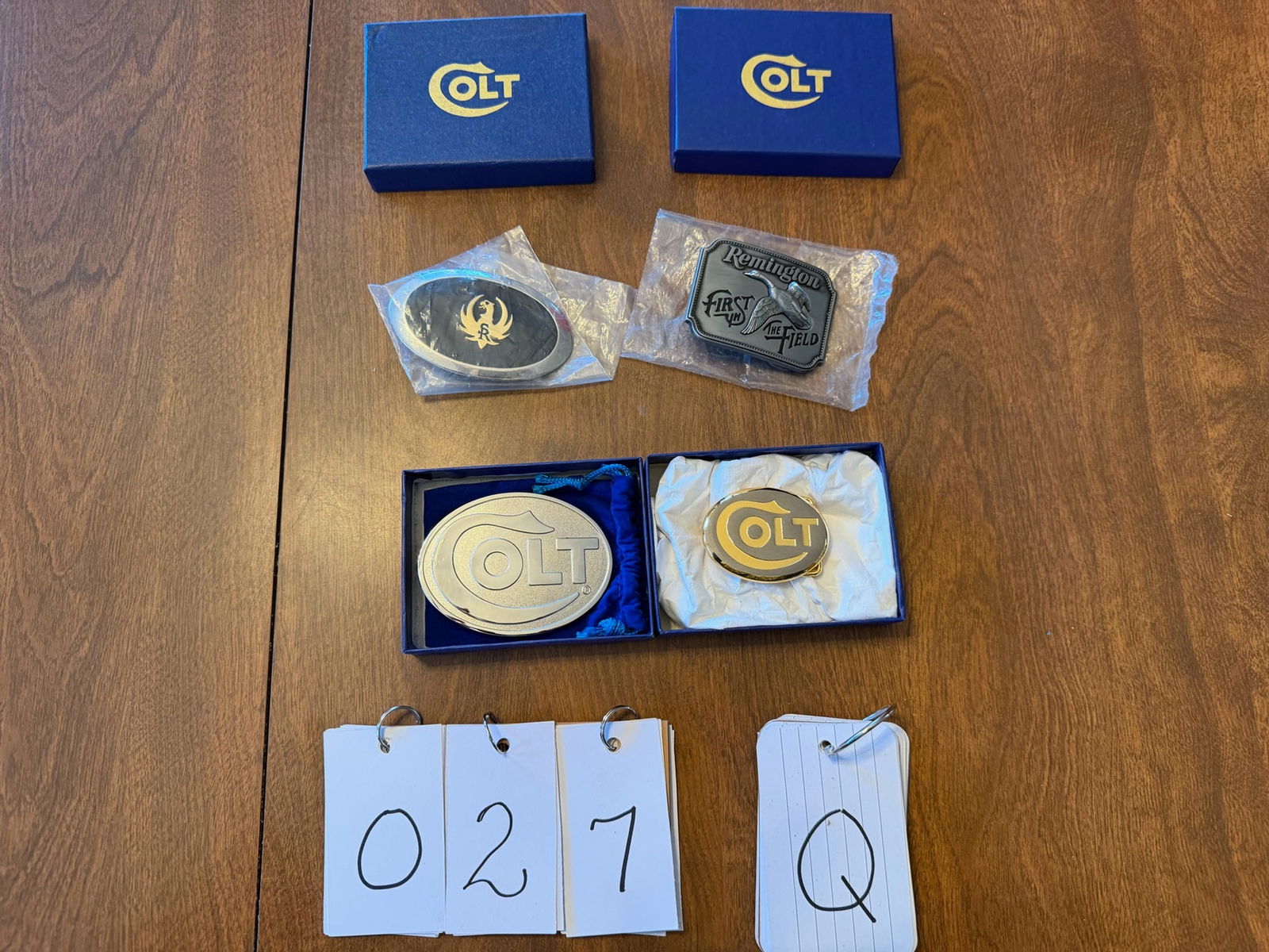 Assorted Lot of Firearm Belt Buckles: Assorted lot of firearm belt buckles. Two Colt, one Ruger and one Remington. See photos.