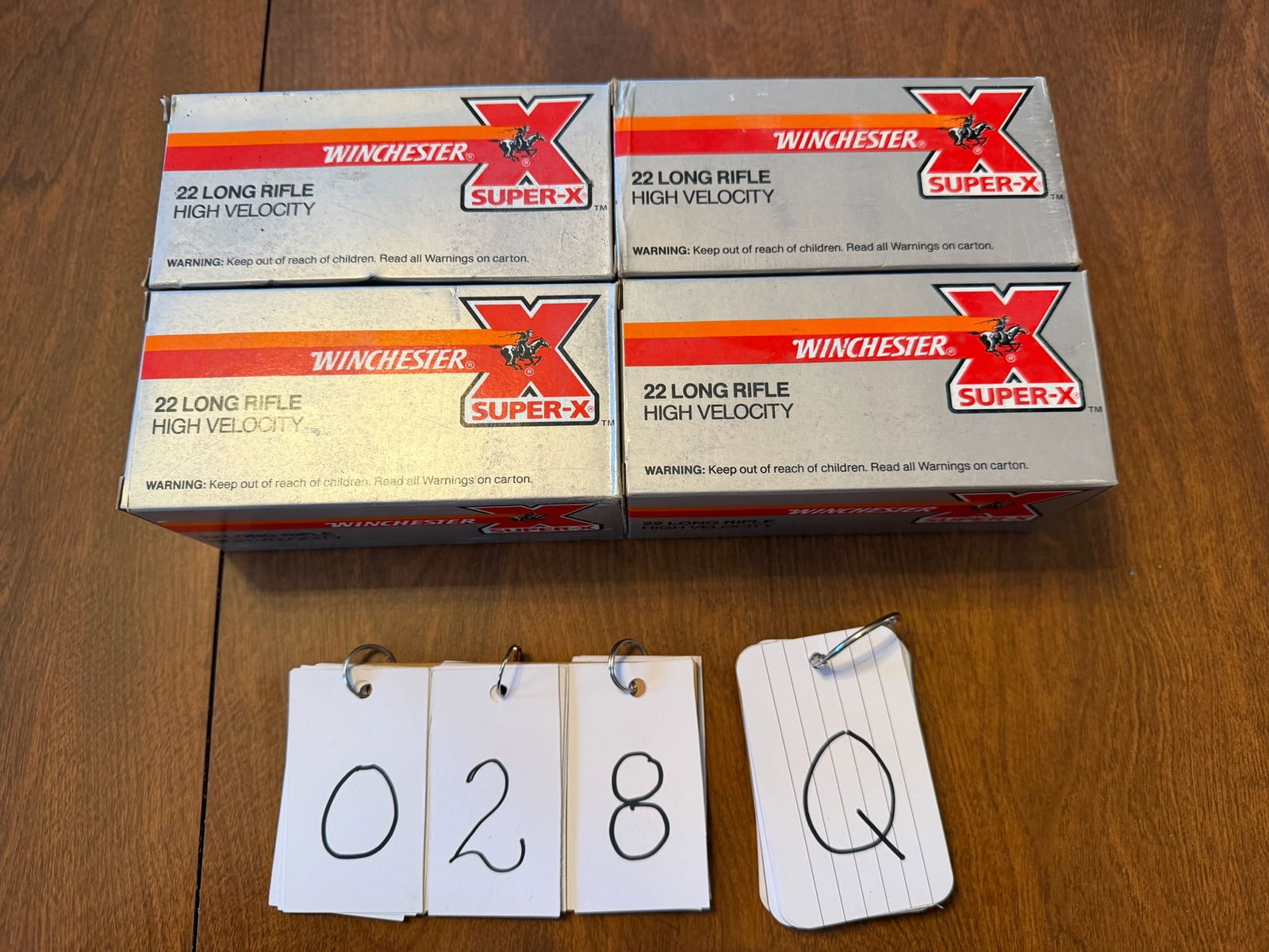 22LR Ammo: Winchester Super X 22LR ammunition. Four bricks of 10 boxes each. 40 grain lead lubaloy coated bullet. 2000 rounds total. See photos.