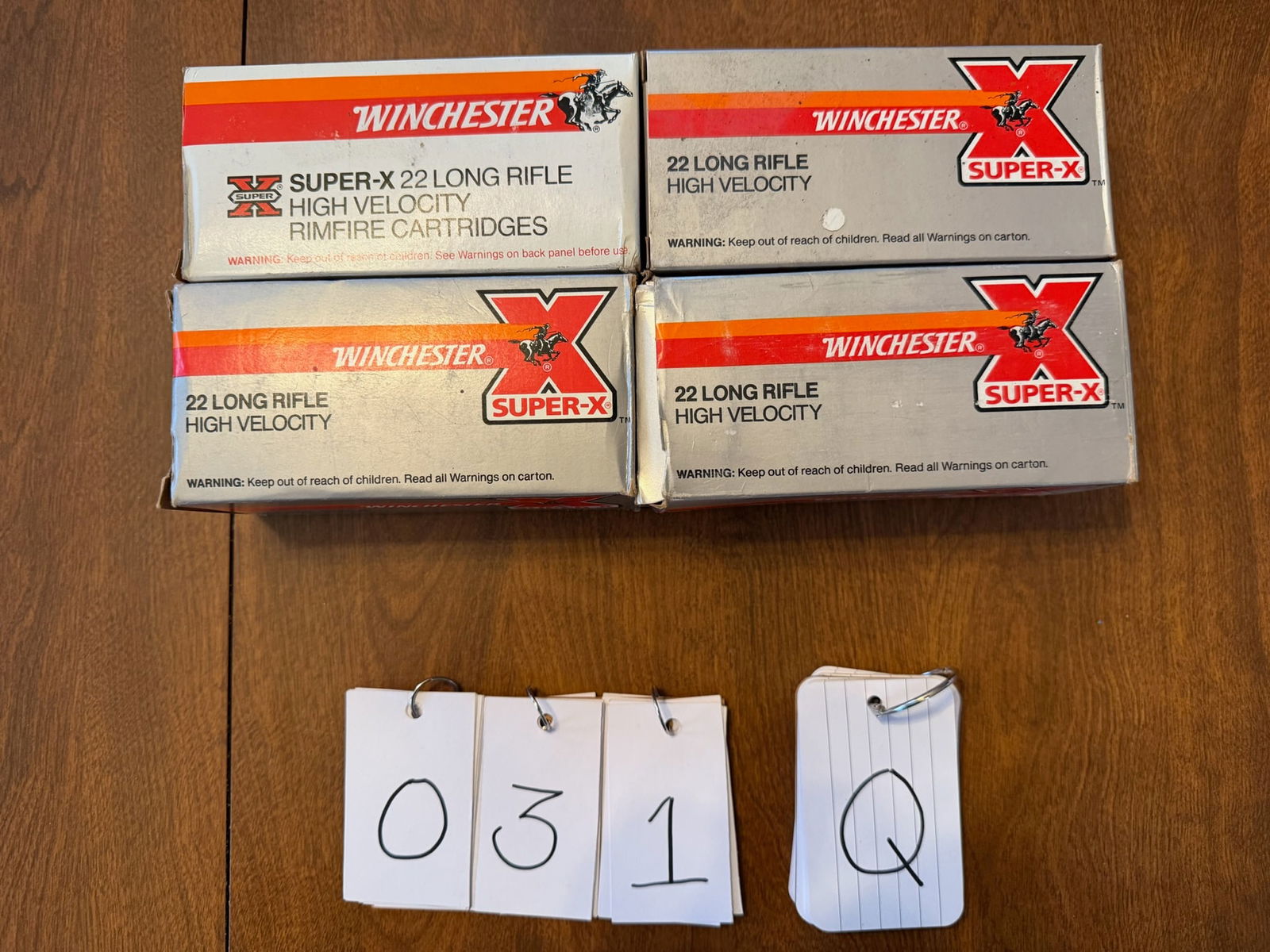 22LR Ammo: 22LR ammunition. Winchester Super X, 40 grain lead lubaloy coated bullets. 1900 rounds total. See photos.