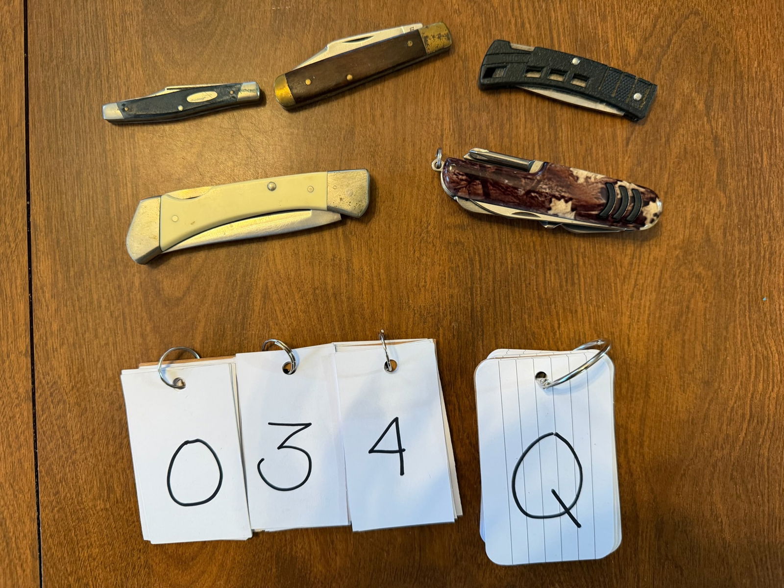 Five Folding Pocket Knives: Five folding pockets knives. One Winchester lock blade. One small Buck two blade. One Swiss army type multi-knife and tool. One L.L. Bean single blade. One small Buck lock blade (425A). See photos.