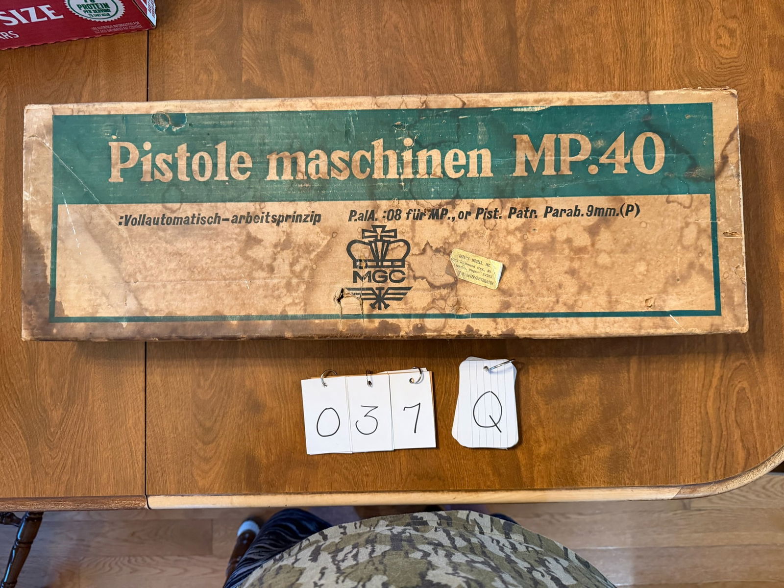 German MP-40 Submachine Gun Replica Model: German MP-40 Submachine Gun replica model. Produced my M.G.C. Co. of Tokyo, Japan. It is a close copy of the original German Maschinen Pistole 40 submachine gun. It has an overall length of 32.8"