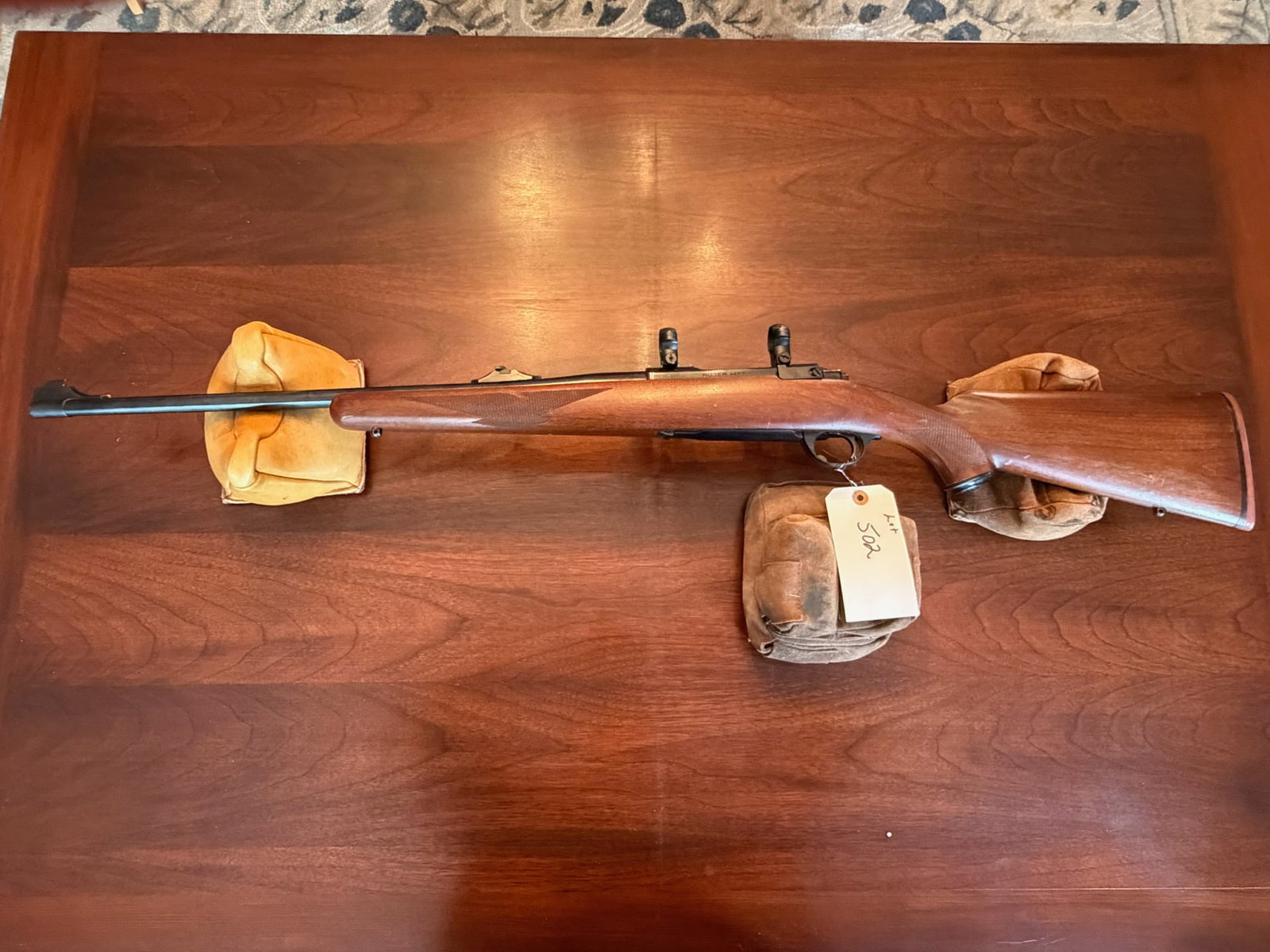 Ruger Model 77: Ruger Model 77. 6mm Remington. 22" barrel. Leupold scope rings. Has custom bolt handle. Serial No. 70-00924. See photos.