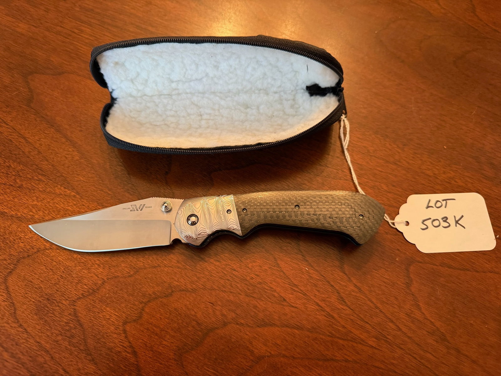 Steve Woods "Woods Fighter" Folding Knife: Steve Woods "Woods Fighter" Ladder Damascus folding knife. 4" blade length, 9.5" overall length. See photos for information. This is the only knife of its kind. See photos