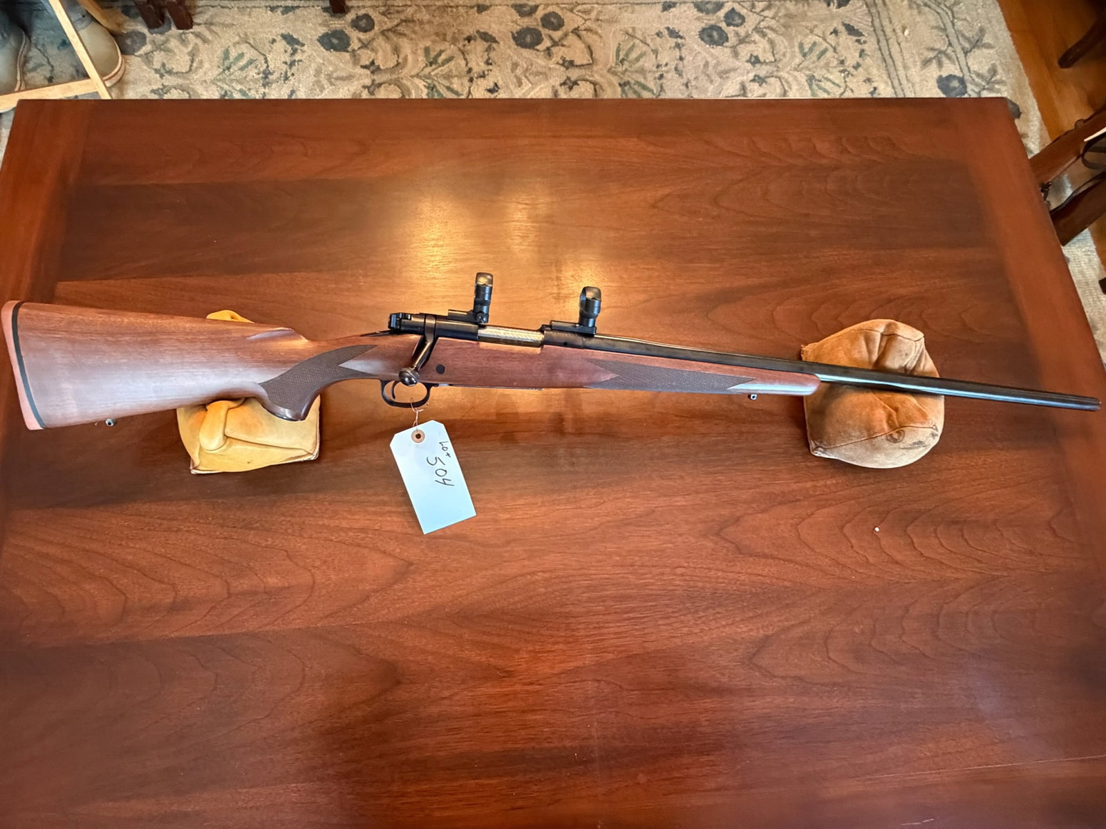Winchester Model 60: Winchester Model 60. 22-250. 26" heavy barrel. Has Leupold scope rings. Serial No. G2102454. See photos.
