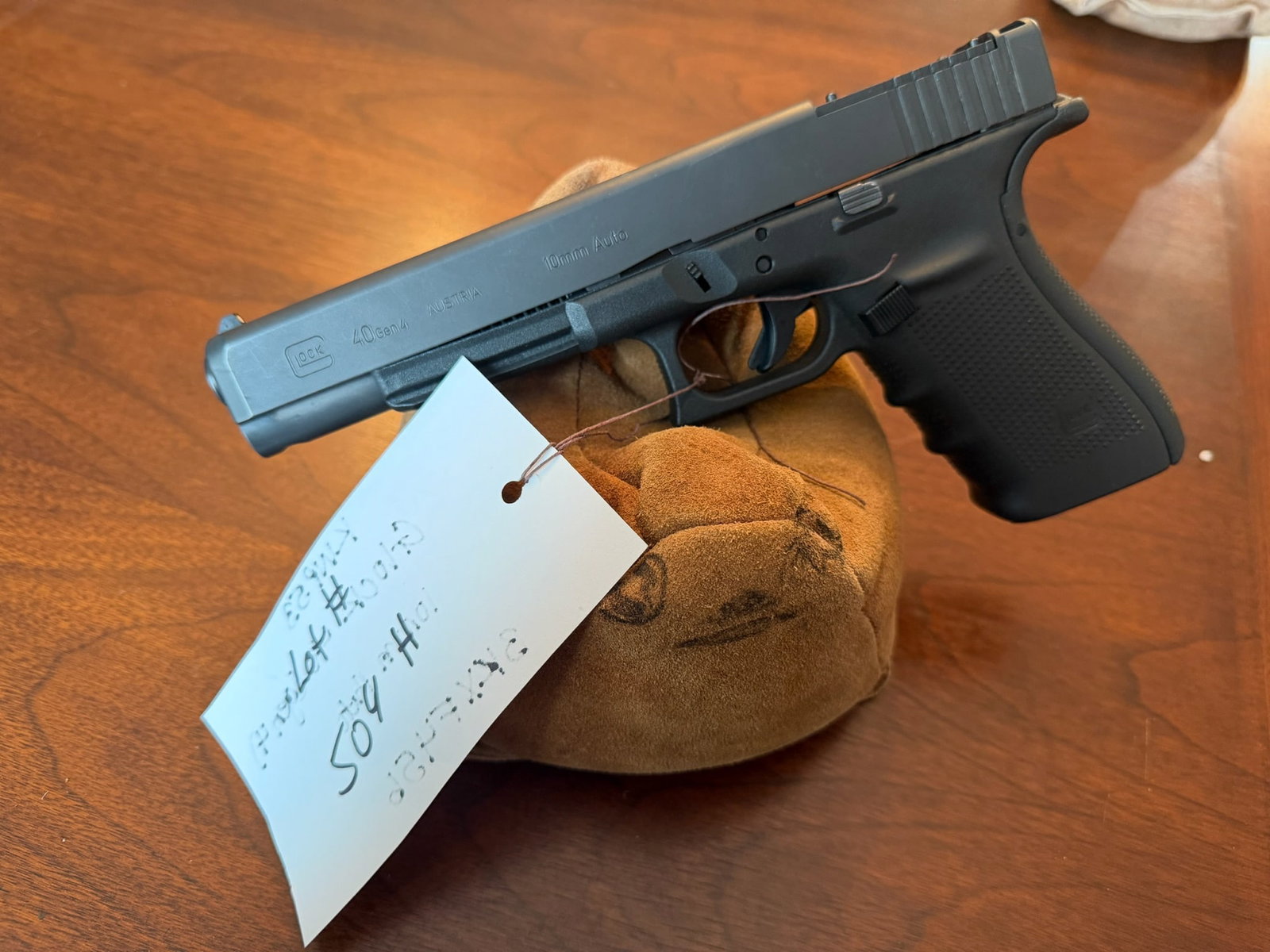 Glock Model 40: Glock Model 40. 10mm Auto. Serial No. BKXF456. See photos.
