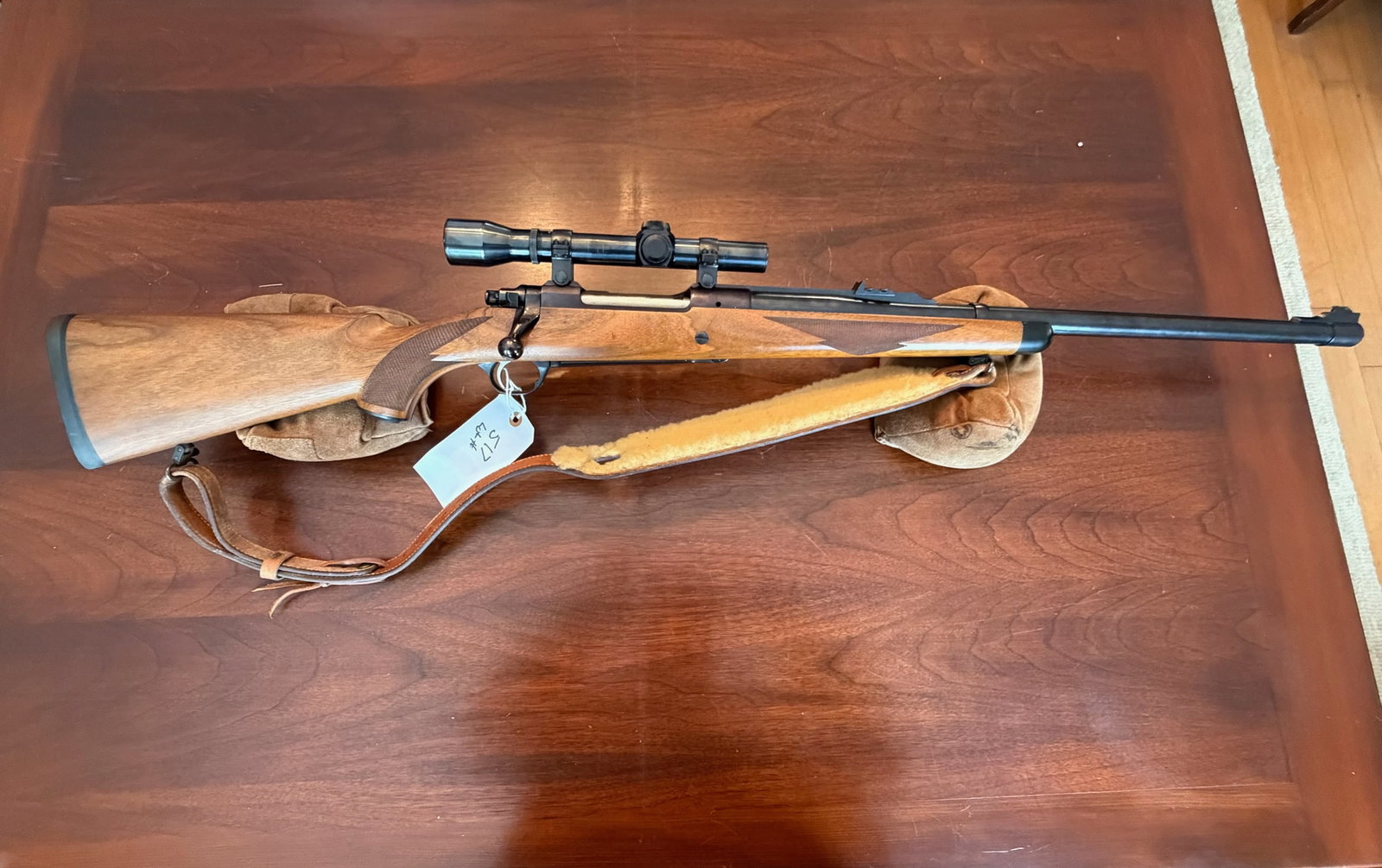 Ruger Model M77 Magnum: Ruger Model M77 Magnum. 416 Rigby. 24" barrel. Leather sling. 2.5x1 scope. Serial No. 78066330. See photos.