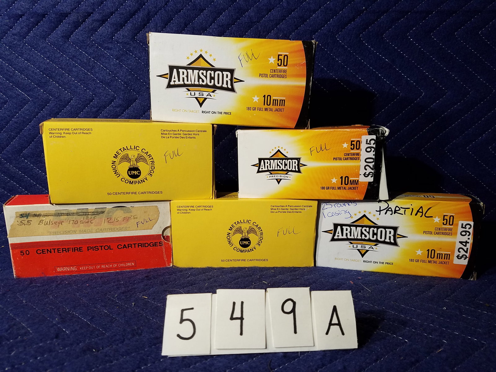 10mm Ammo: 10mm ammunition. Three boxes of Armscor USA, 180 grain FMJ (125 rounds). Two boxes of UMC, 180 grain (100 rounds). One box of PMC, 200 grain FMJ (50 rounds). 275 rounds total. See photos.