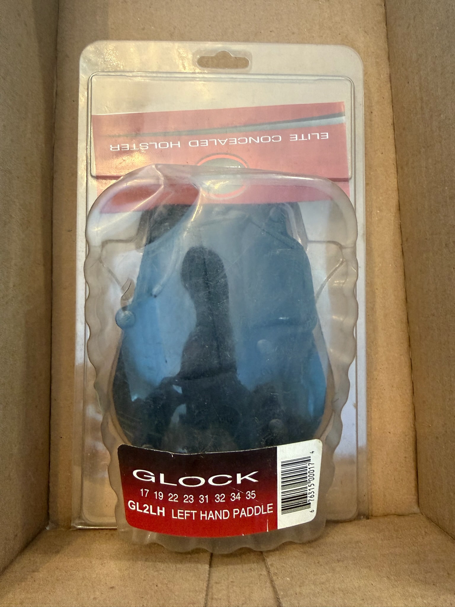 Three Fobus Elite Concealed Paddle Holsters: Three Fobus Elite Concealed Paddle Holsters. Left hand for Glock Models 17/19/22/23/31/32/34/35. New in the packaging. See photos.