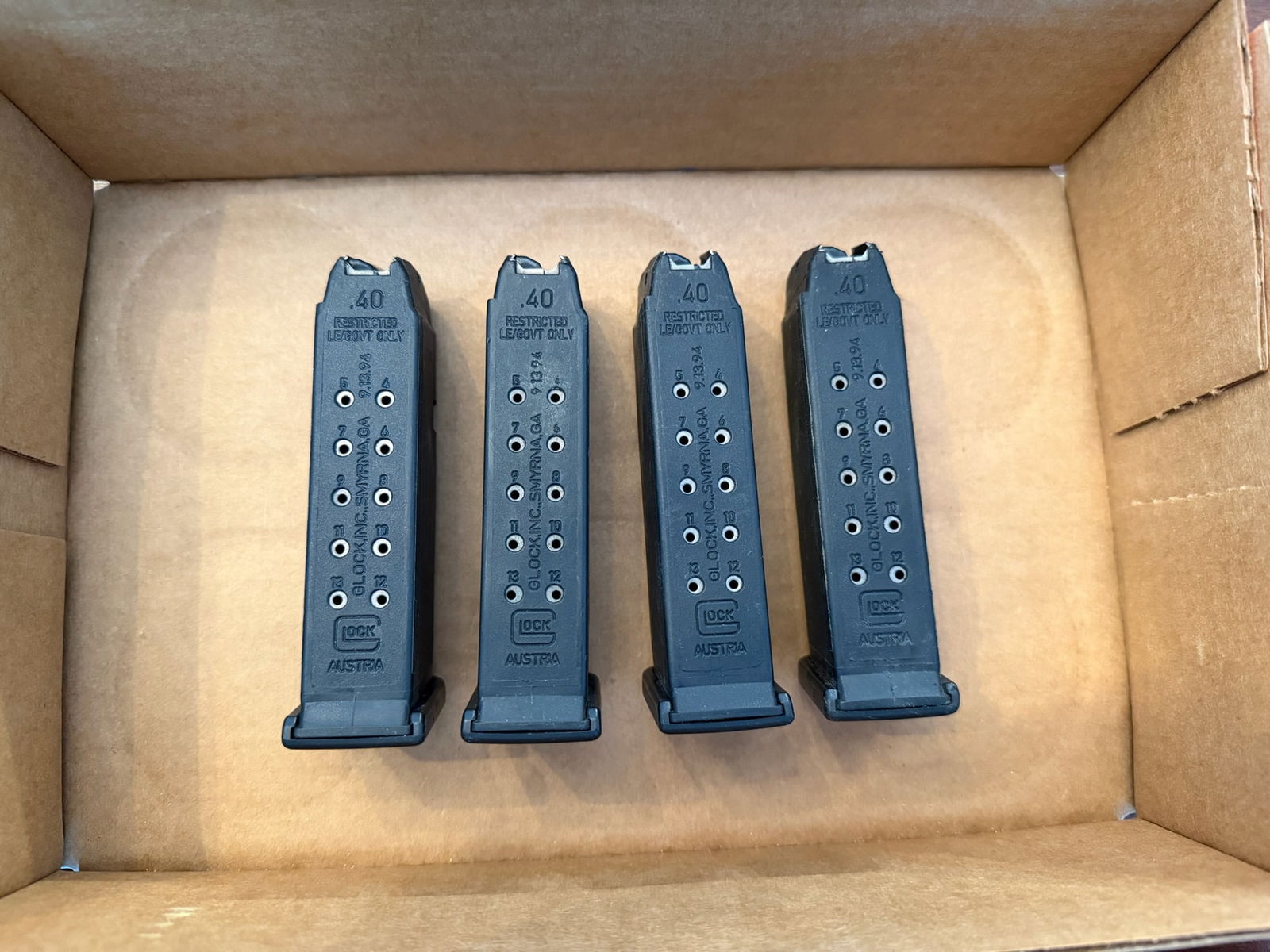 Four Glock 13 Round 40 Caliber Magazines: Four Glock 13 round 40 Caliber magazines. See photos. LEO, FFL OR OUT OF STATE SALES ONLY. MAGAZINES ARE NOT NYS COMPLIANT.