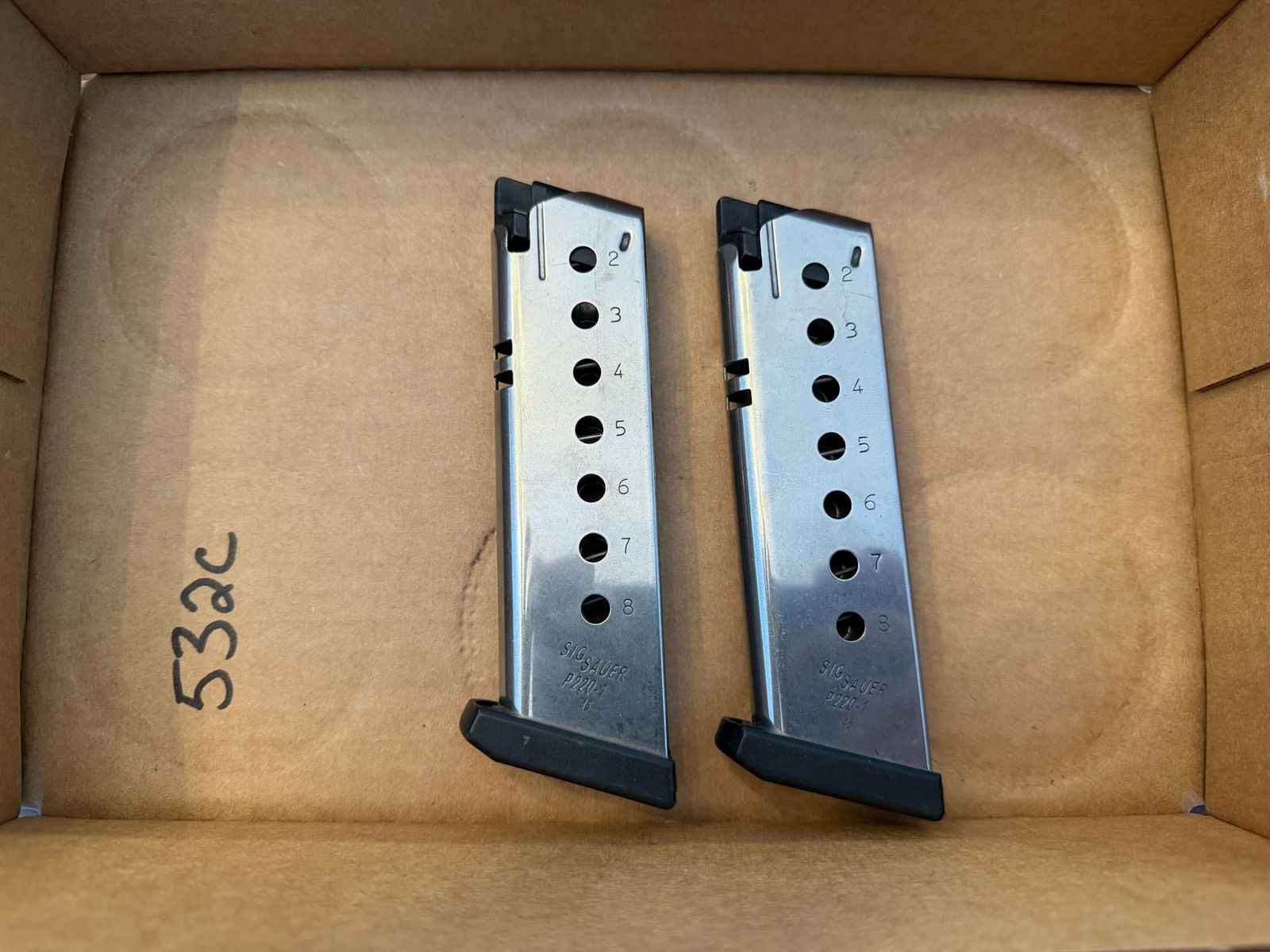 Two Sig Sauer P220 Eight Round 45 Auto Magazines: Two Sig Sauer P220 eight round 45 Auto magazines. See photos.
