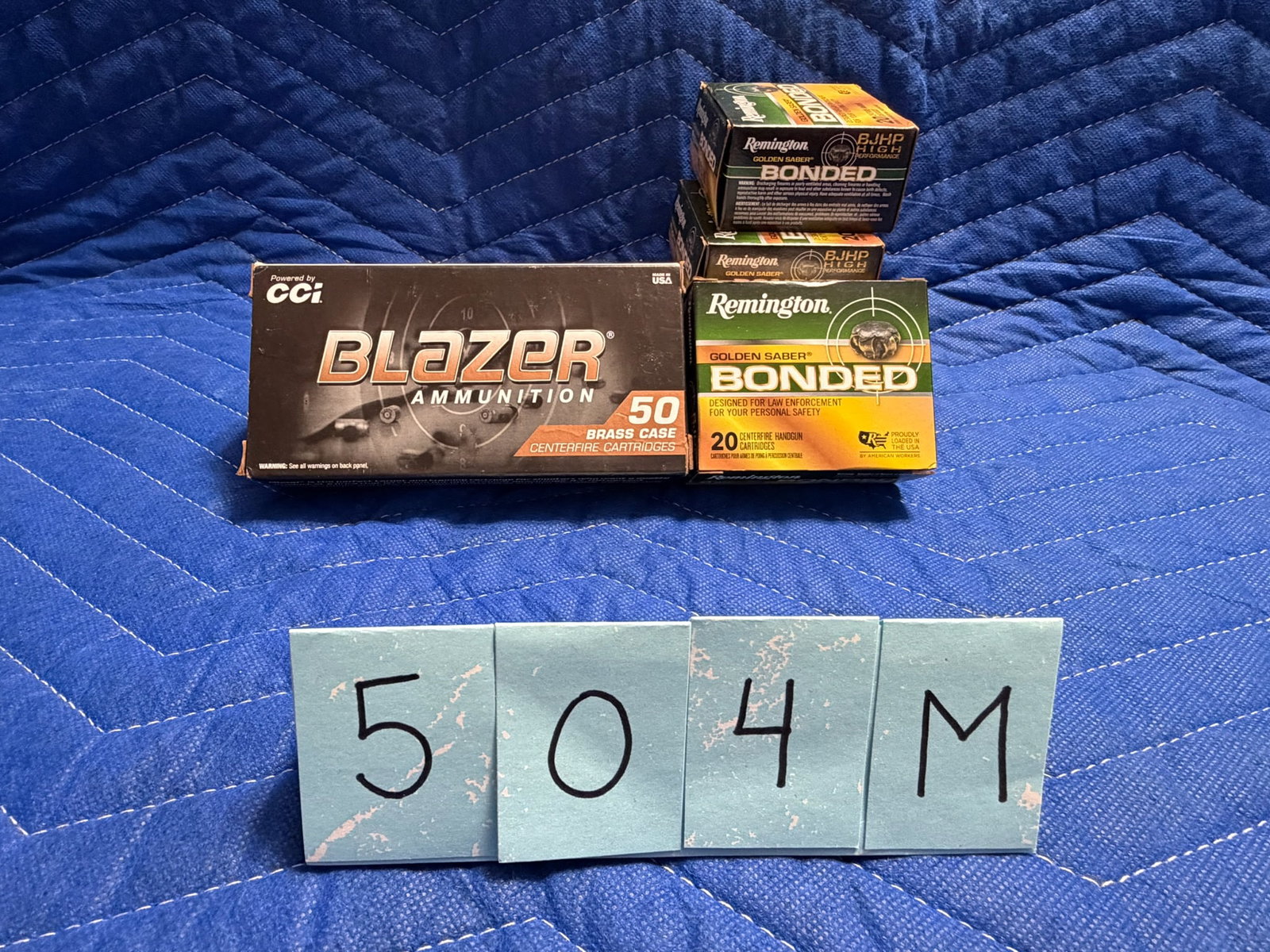 40 Smith & Wesson Ammo: 40 Smith & Wesson ammunition. Two boxes of Blazer, 165 grain FMJ (100 rounds). Four boxes of Remington, 165 grain bonded JHP (80 rounds). 180 rounds total. See photos.