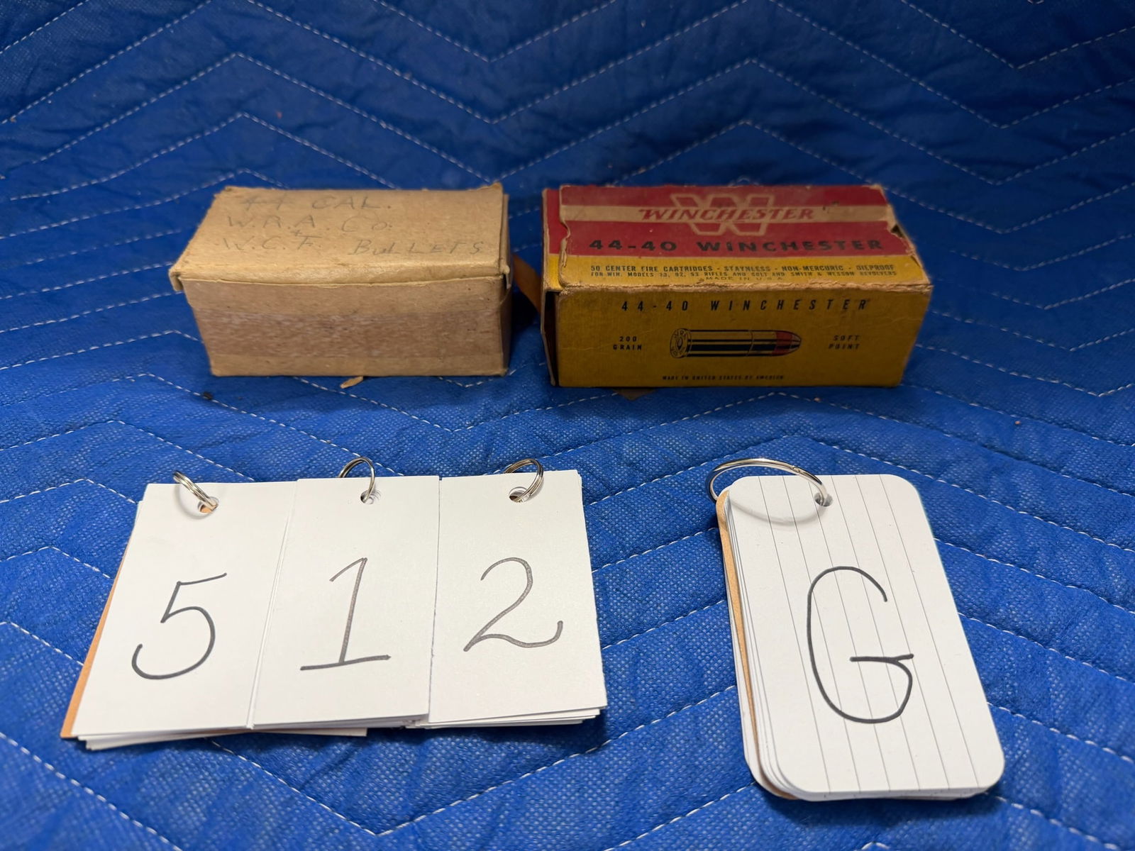 44-40 Winchester Ammo: 44-40 Winchester ammunition. One vintage box of Winchester, 200 grain SP (50 rounds). One box of 44 caliber WRA Co., WCF bullets (approx. 33 rounds). See photos.