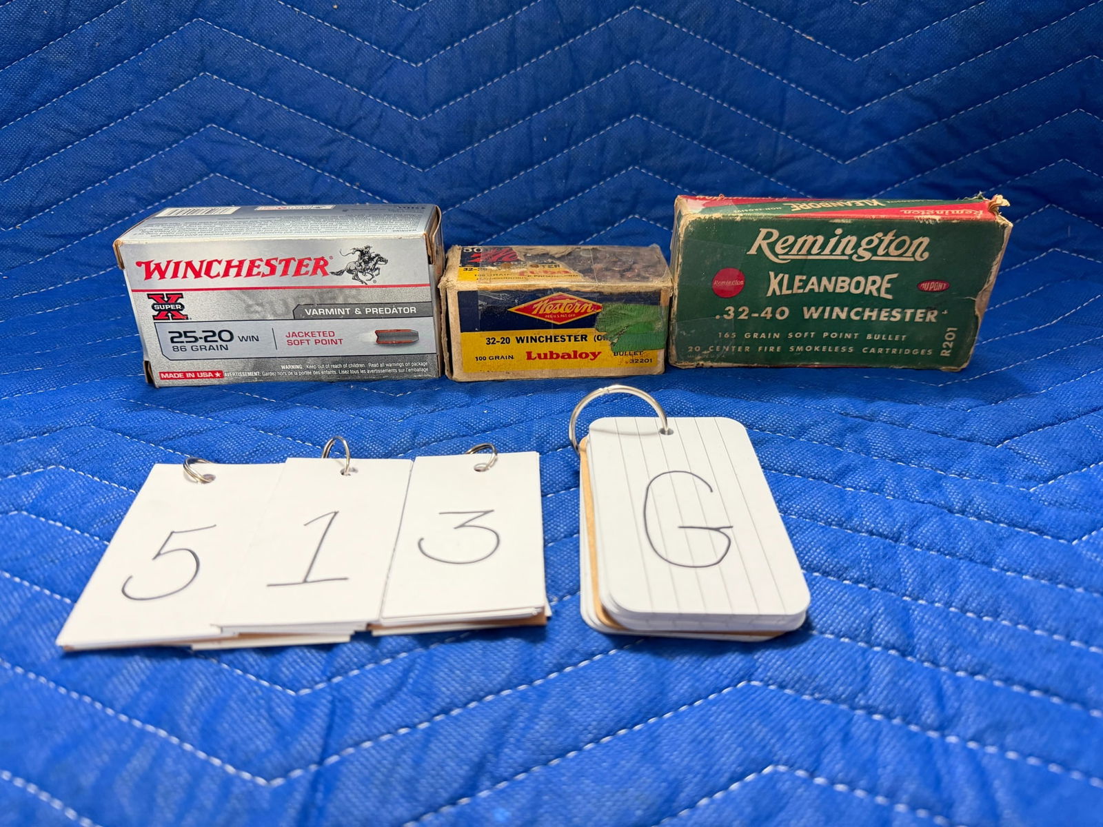 Assorted Lot of Ammo: Assorted lot of ammunition. One vintage box of Remington Kleanbore 32-40 Winchester, 165 grain SP (13 rounds). One vintage box of Western 32-20 Winchester, 100 grain lubaloy bullet (44 rounds). One bo