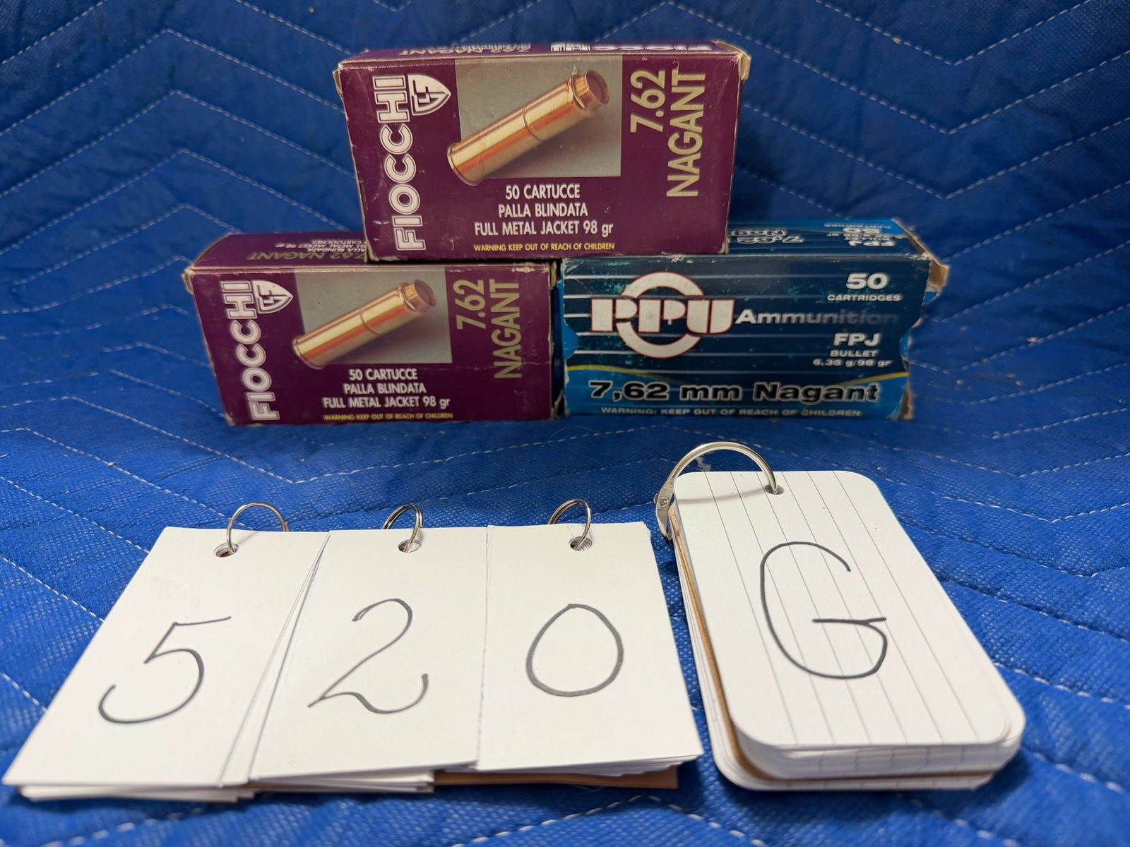 7.62mm Nagant Ammo: 7.62mm Nagant ammunition. Two boxes of Fiocchi, 98 grain FMJ (97 rounds). One box of PPU, 98 grain FPJ (36 rounds). 133 rounds total. See photos.