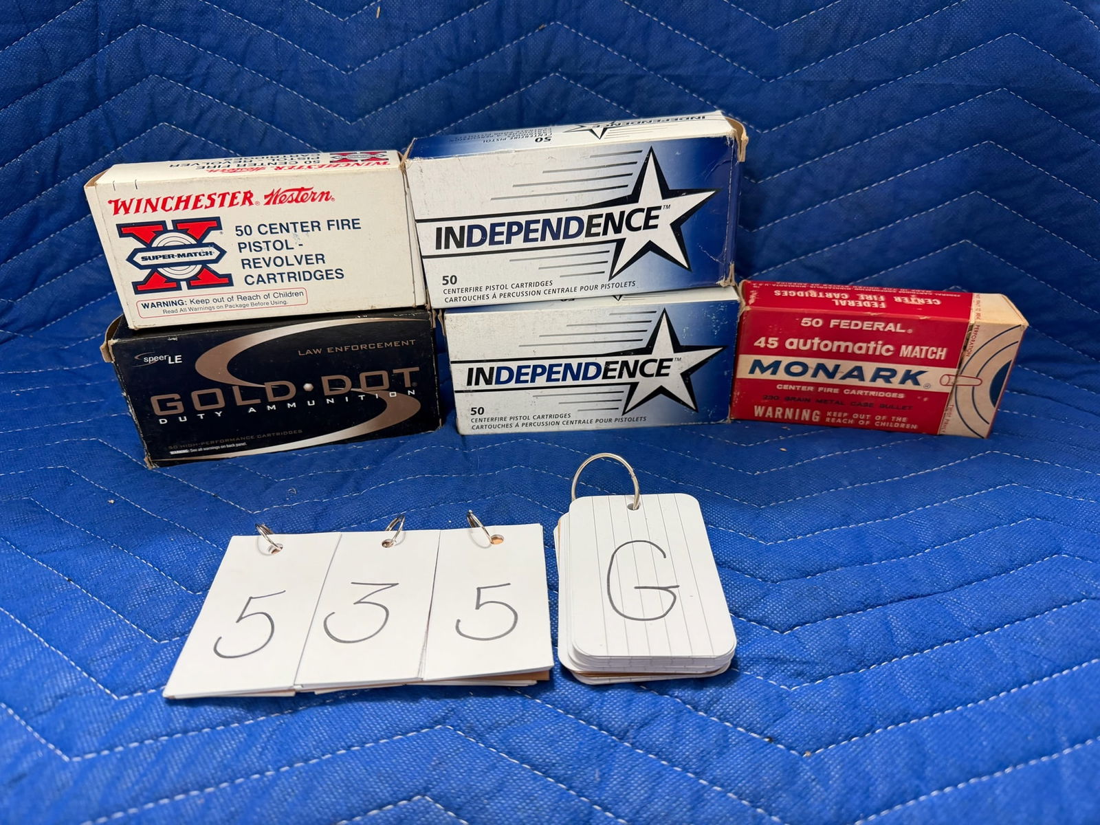45 Auto Ammo: 45 Auto ammunition. Two boxes of Independence, 230 grain FMJ (76 rounds). One box of Federal, 230 grain metal case bullets (50 rounds). One box of Winchester Western, 185 grain full metal case (50