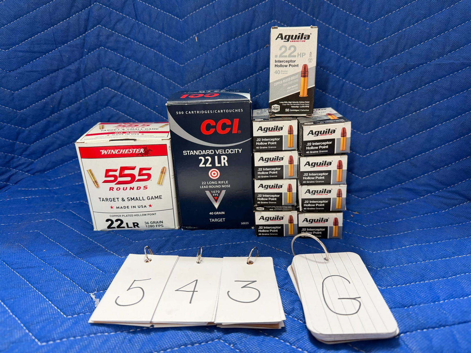 22LR Ammo: 22LR ammunition. Nine boxes of Aguila, 40 grain HP (450 rounds). One box of CCI, 40 grain lead round nose (500 rounds). One box of Winchester, 36 grain copper plated HP (555 rounds). 1505 rounds total