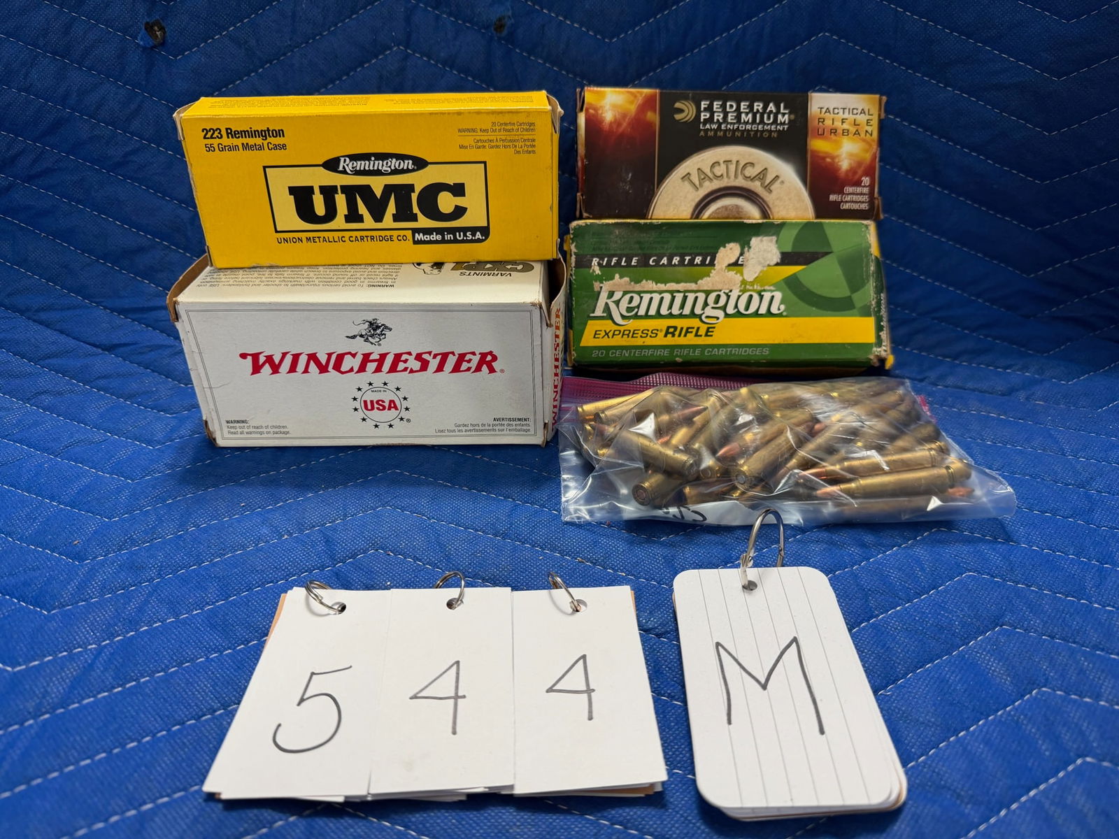 223 Remington Ammo: 223 Remington ammunition. One box of Winchester, 45 grain JHP (40 rounds). One box of Remington UMC, 55 grain metal case (20 rounds). One box of Remington, 62 grain HP (20 rounds). One box of Federal,