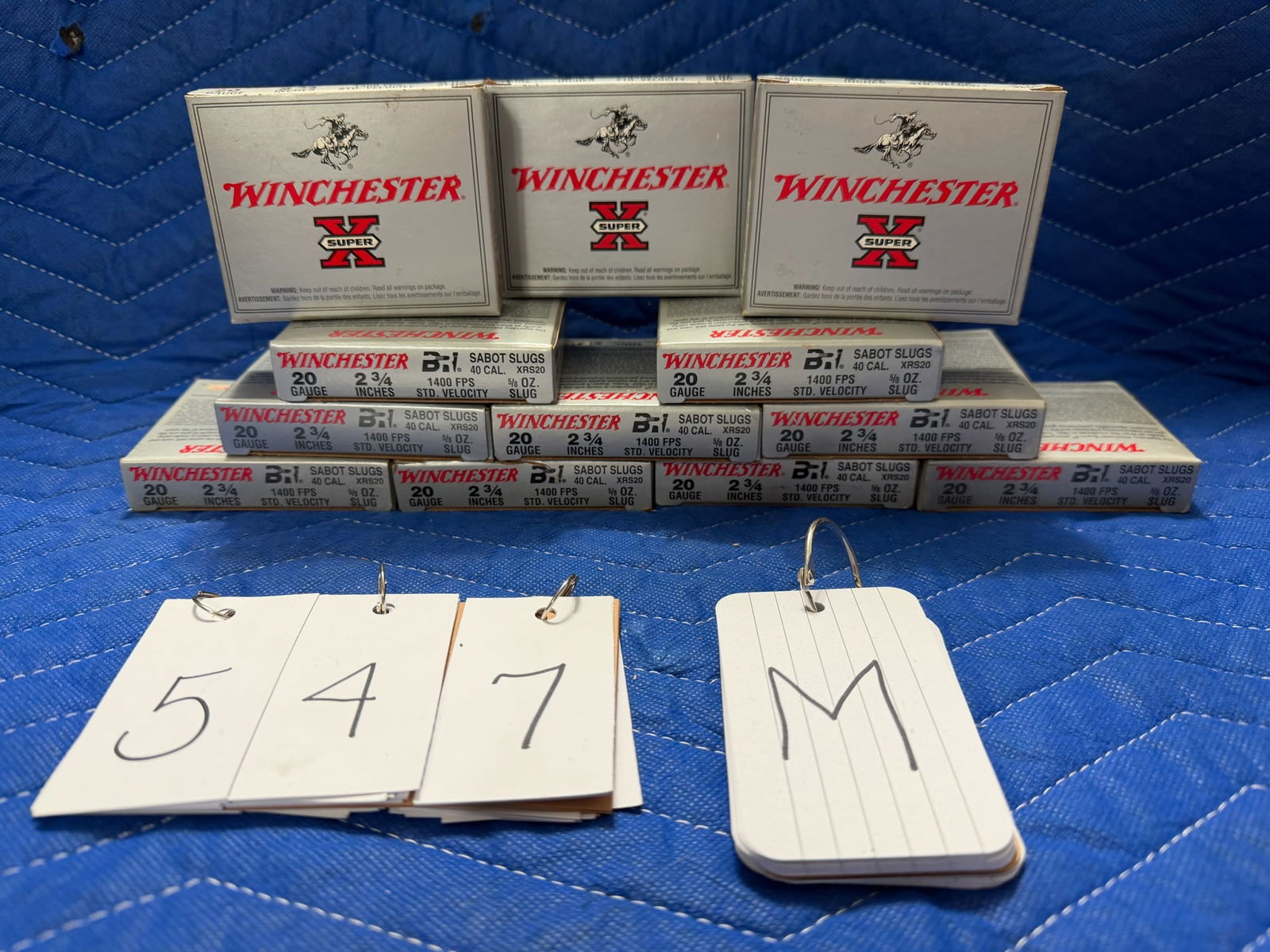 20 Gauge Sabot Slug Ammo: Winchester Super X 20 gauge sabot slug ammunition. 12 boxes, 2.75", .625 oz. 60 rounds. See photos.
