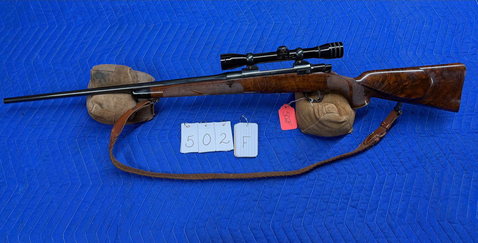 Sako Finnbear Deluxe: Sako Finnbear Deluxe. 25-06 Remington. 24" barrel, marked H. DUMOULIN & FILS-MILMORT-LIEGE-MADE IN BELGIUM. Receiver marked L61R. Has a jeweled bolt, deluxe stock and braided leather sling. Comes