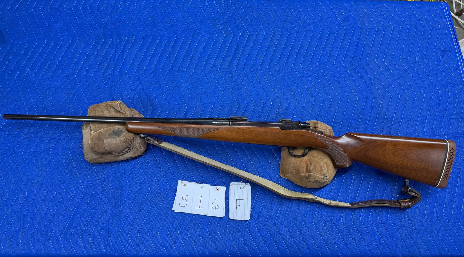 Ruger Model 77: Ruger Model 77. 7mm Remington Magnum. 24" barrel. Tang safety. Has Stalker 335 leather sling. In excellent condition. Serial No. 72-99734. See photos.