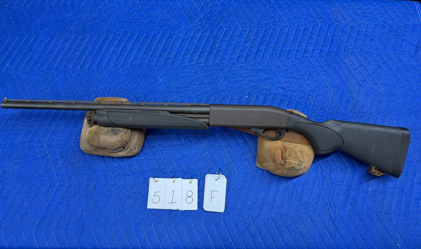 Remington Model 870: Remington Model 870. 20 gauge. 2.75" or 3" shells. 20" vent rib barrel. Has choke. Synthetic black stock. 1" leather sling. Minor rust on vent rib portion of barrel. Otherwise in good condition. Seria