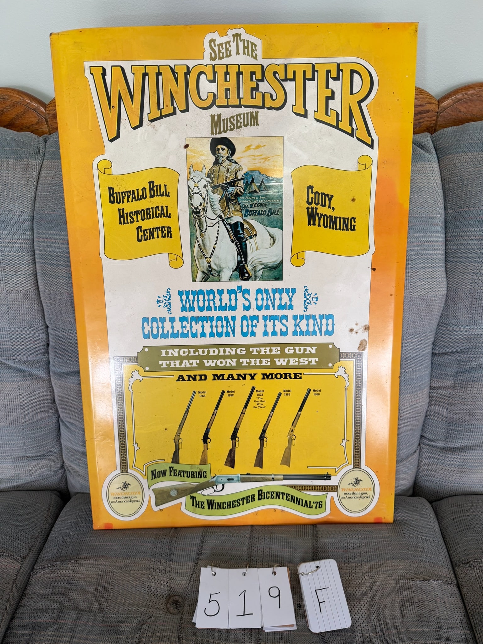 Vintage "See the Winchester Museum" Tin Advertising Sign: Vintage "See the Winchester Museum" tin over cardboard advertising sign. Buffalo Bill Historical Center Cody, Wyoming. World's Only Collection of Its Kind. Including the Gun That Won the West. And