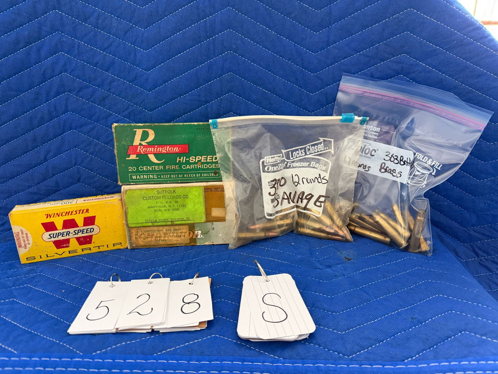 303 British and 300 Savage Ammo and Brass: 303 British and 300 Savage ammunition and brass casings. One box of Remington 303 British, 215 grain SP (18 rounds). 12 303 British brass casings. One box of Winchester Silver Tip 300 Savage, 180 grai