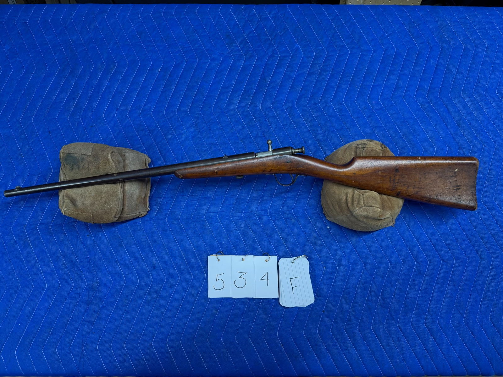 Winchester Model 1900 Takedown: Winchester Model 1900 Takedown. Single shot 22S/L. 18" barrel. Manufactured by the Winchester Repeating Ars Co., New Haven, CT. USA Pat. August 29, 1899. Small crack in the stock near the chamber.