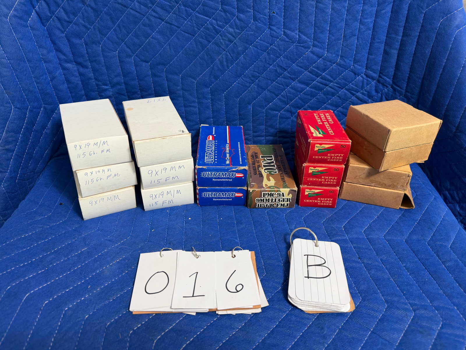 9mm/9x19mm Ammo: 9mm/9x19mm ammunition. Six boxes of reloads, 115 grain FMJ (297 rounds). Two boxes of Ultramax remanufactured ammunition, 125 grain round nose (85 rounds). One box of PMC, 115 grain FMJ (50 rounds). T