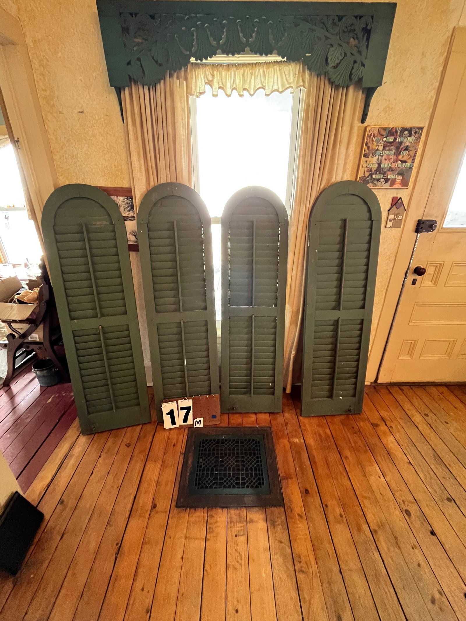 Four Round Top Shutters: Four round top shutters circa late 1800s to early 1900s. 16.75"w x 59.5"h x 1"d. See photos. Please read the Terms and Conditions of this auction THOROUGHLY for IMPORTANT bidder information.