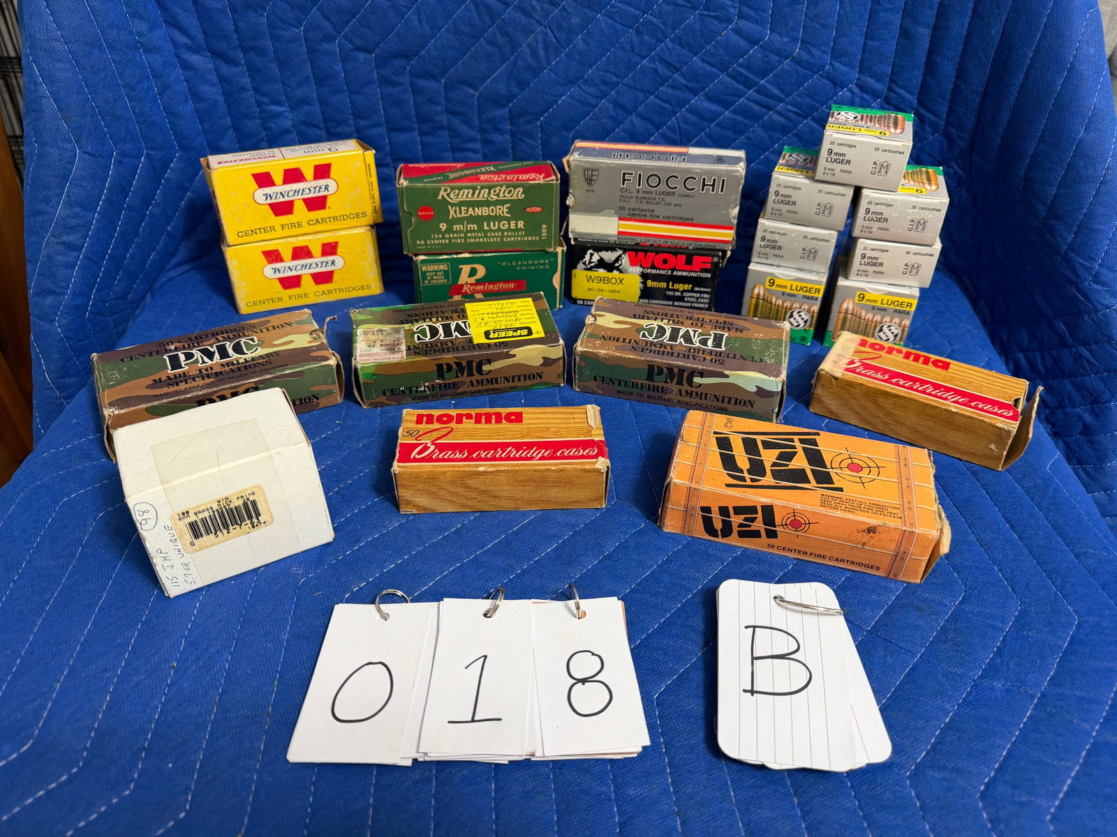 9mm Ammo: 9mm ammunition. Nine boxes of Sellier & Bellot, 115 grain ball (225 rounds). One box of Winchester, 115 grain ball (50 rounds). One box of Winchester, 115 grain lead reload (50 rounds). Two boxes of