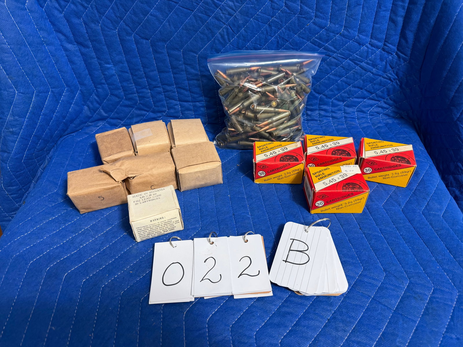 5.45x39mm Ammo: 5.45x39mm ammunition. Four boxes of Sporting Rifle Ammunition, Made in Russia, 59 grain FMJ BT (120 rounds). Six sealed paper cases (180 rounds). One box of Romania (20 rounds). One loose bag with