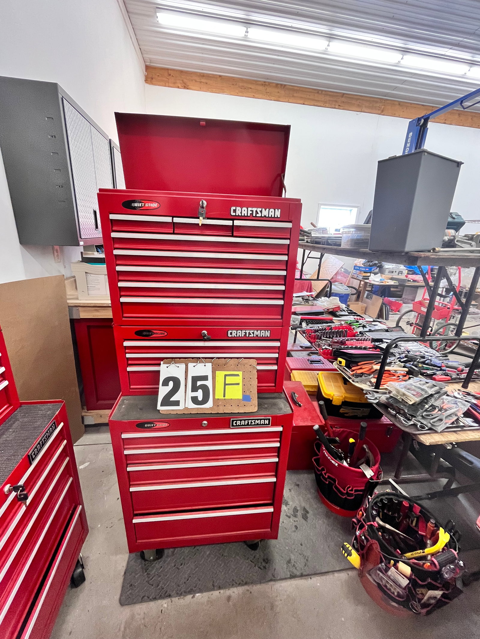 Three Sectional Craftsman Rolling Tool Chests: Three sectional Craftsman rolling tool chests. In like new condition. Two pieces each. 16 drawers. With keys. 25"w x 19"d x 65"h. Top is 12"d. See photos. Please read the Terms and Conditions of this 