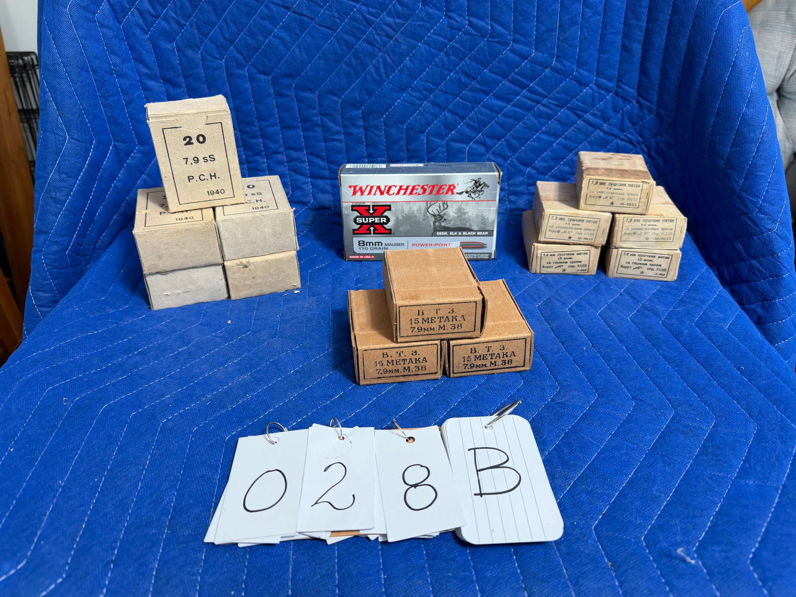 7.92x57mm Mauser (8mm Mauser) Ammo: 7.92x57mm Mauser (8mm Mauser) ammunition. Five boxes of 7.9sS P.C.H. 1940 (100 rounds). Five boxes marked 1953 (75 rounds). Three boxes of B.T.3. 15 METAKA with 15 rounds each loaded into three stripp