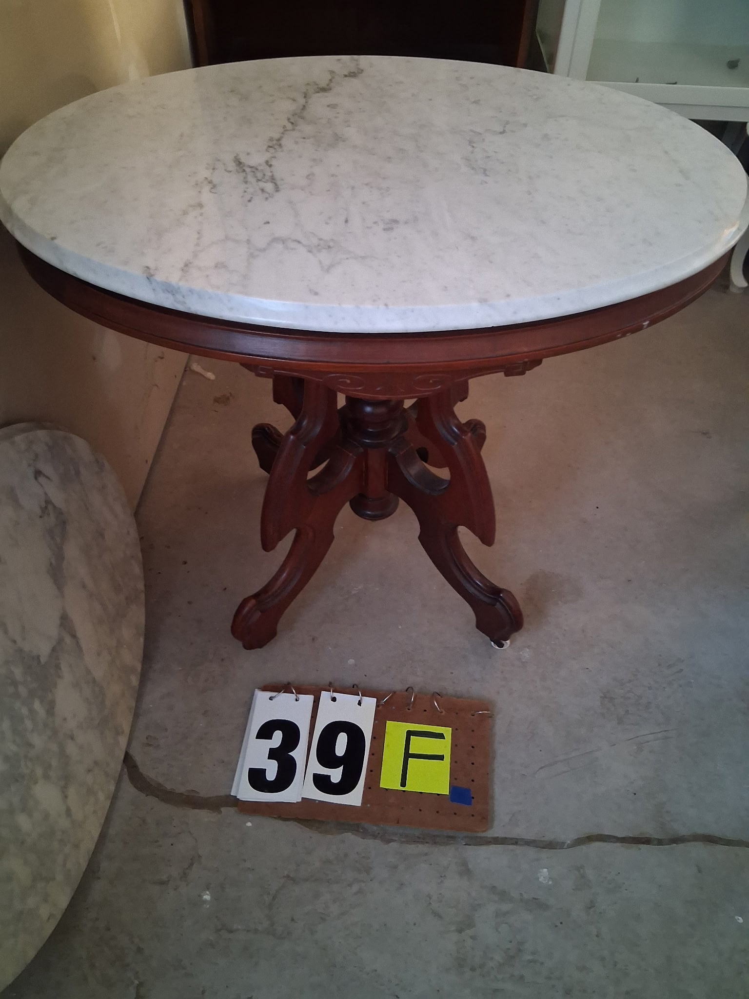 1890s American Oval Marble Top Table: 1890s American oval marble top table. 33.5"l x 24.5"w x 29.75"h. See photos. Please read the Terms and Conditions of this auction THOROUGHLY for IMPORTANT bidder information.