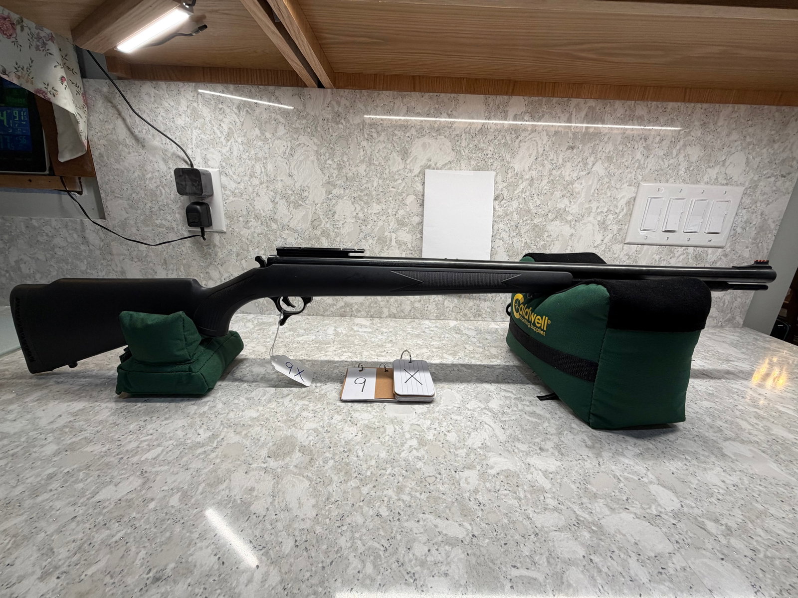 Thompson Center Arms Black Diamond: Thompson Center Arms Black Diamond 50 caliber muzzleloader. 28" barrel marked Thompson Center Arms, Rochester, New Hampshire. Black powder of pyrodex only. Has mounted scope base. Number 92A black syn