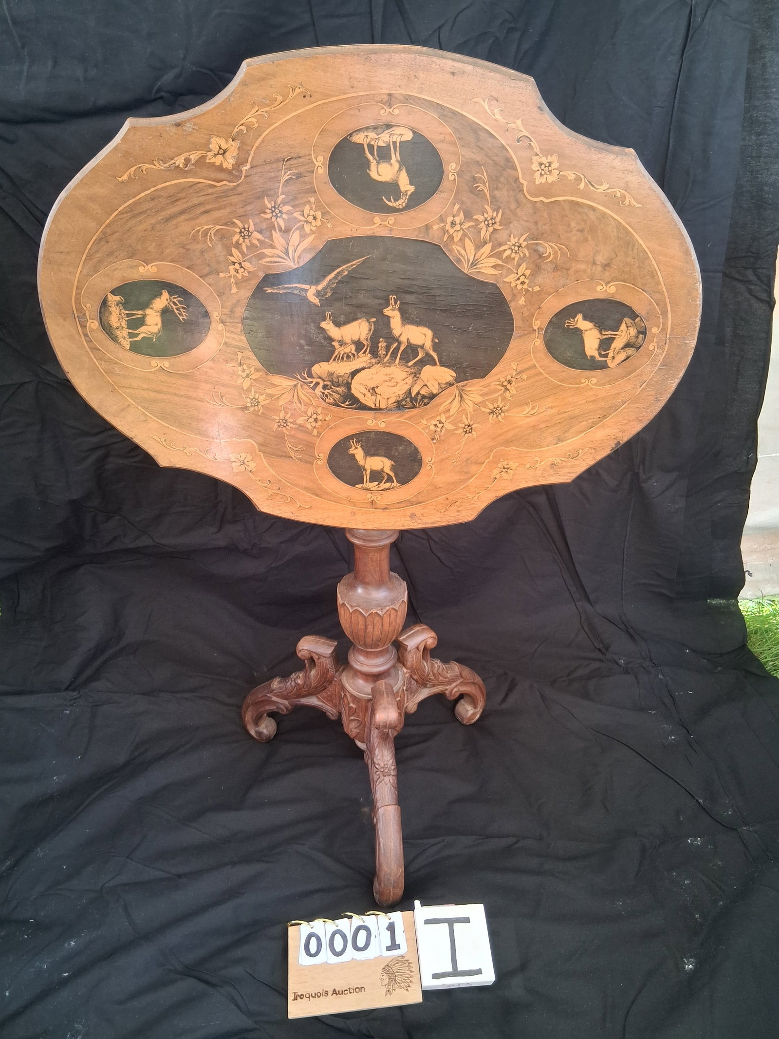 Exceptional 1800s Swiss Black Forest Walnut Inlaid and Carved Tilt Top Table: Exceptional 1800s Swiss Black Forest walnut inlaid and carved tilt top table. This beautiful work of art has several features inlaid to the top of the table, including one baby mountain goat, one