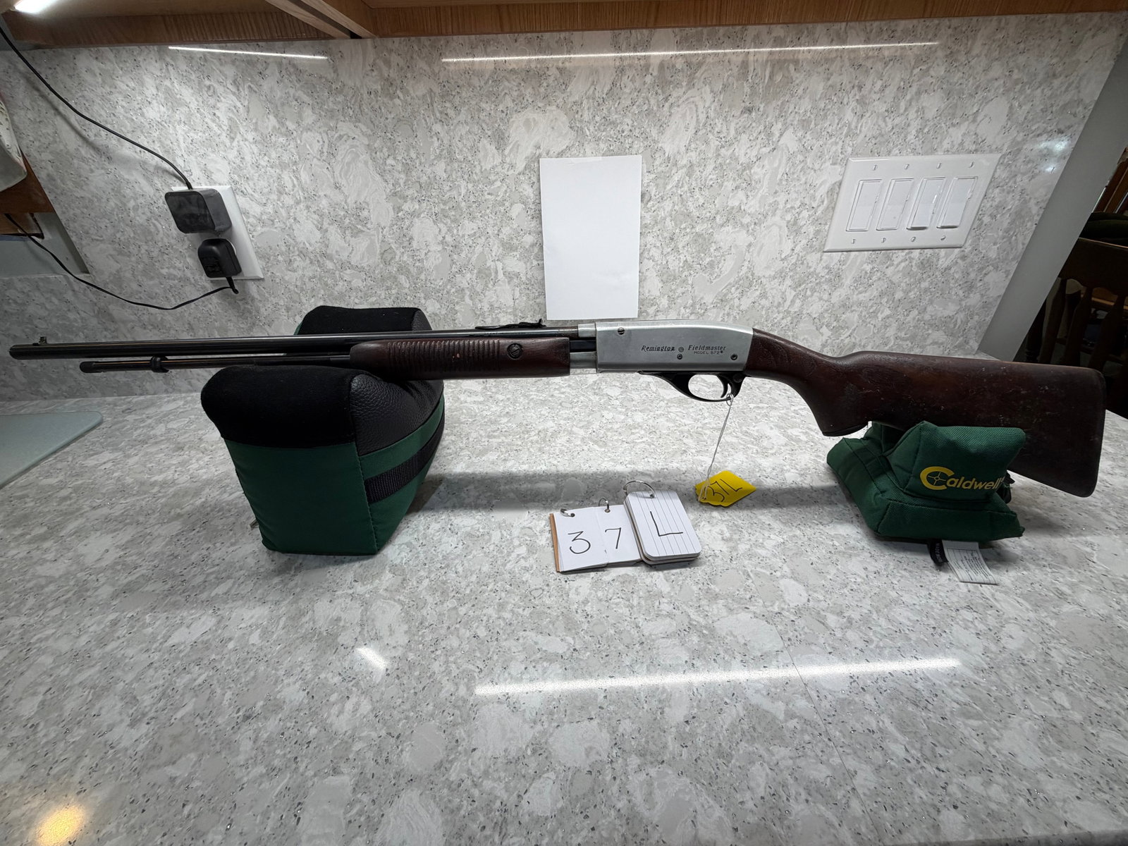 Remington Fieldmaster Model 572: Remington Fieldmaster Model 572. Pump action 22S/L/LR. 23" barrel. Tubular magazine. Stock has dings and finish loss, metal has minor pitting. Overall in fair condition. NSN. See photos. Please read