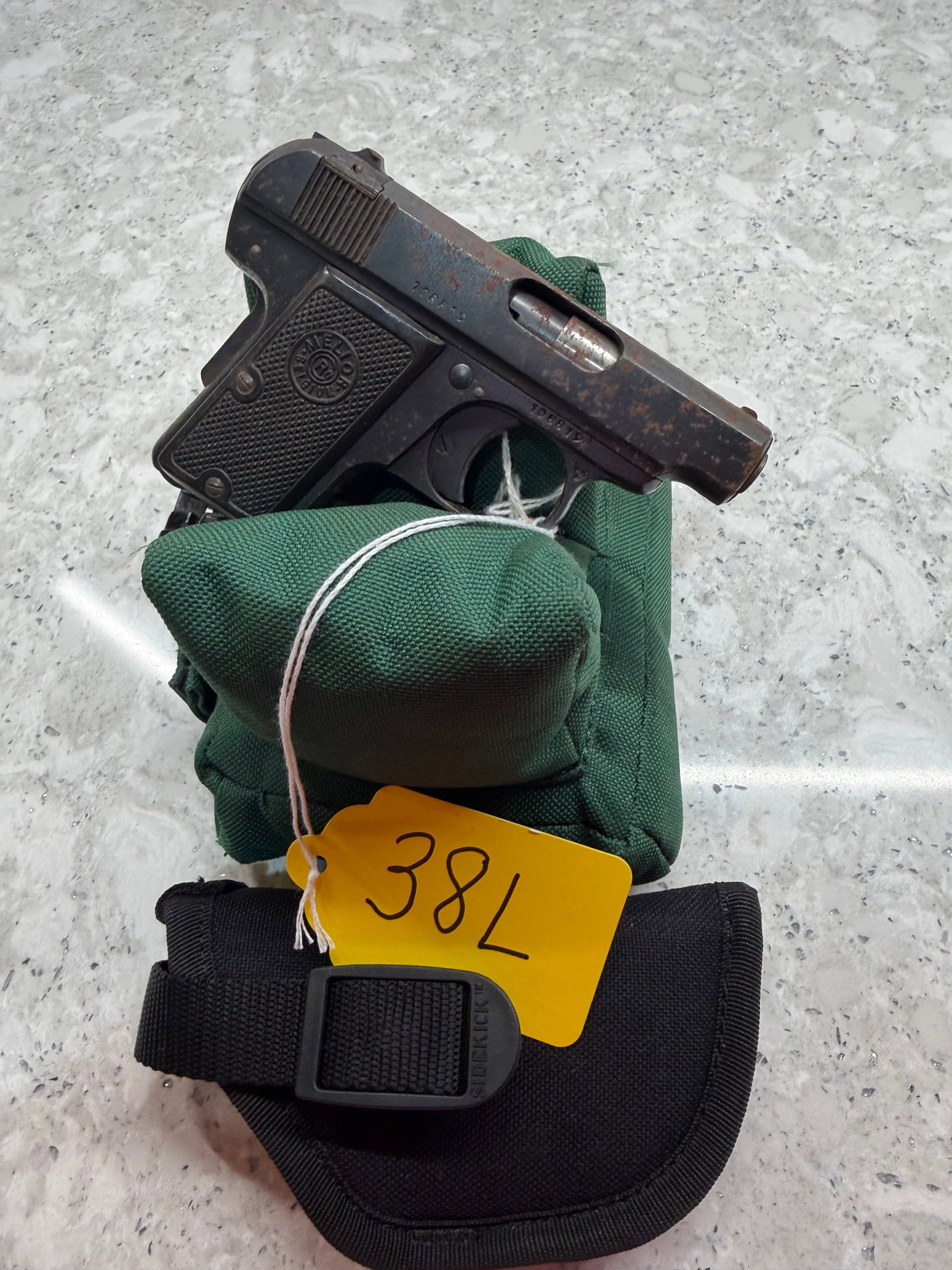 Melior New Model (Type II Variation) 6.35mm: Melior New Model (Type II Variation) 6.35mm (25ACP). Built by Belgian maker Robar & de Kerckhove. Has rust and pitting throughout but appears to function. In overall fair condition. Comes with Uncle