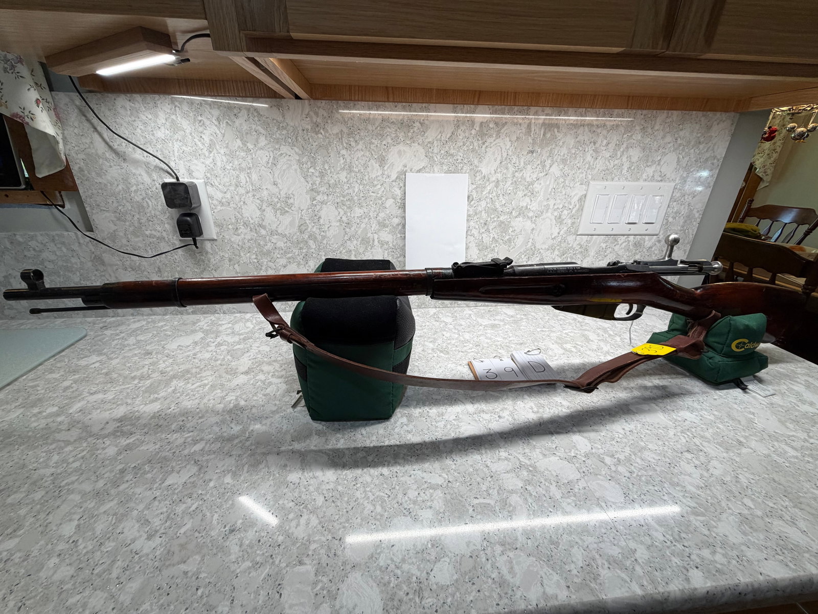 Mosin-Nagant M91 Service Rifle: Mosin-Nagant M91 Service Rifle. 7.62x54R. 28" barrel. Has #40 stamped on the bolt. Marked 1943 on receiver and as a star with number UM40. Produced at Tula Arms Plant and imported by Century Arms Inte